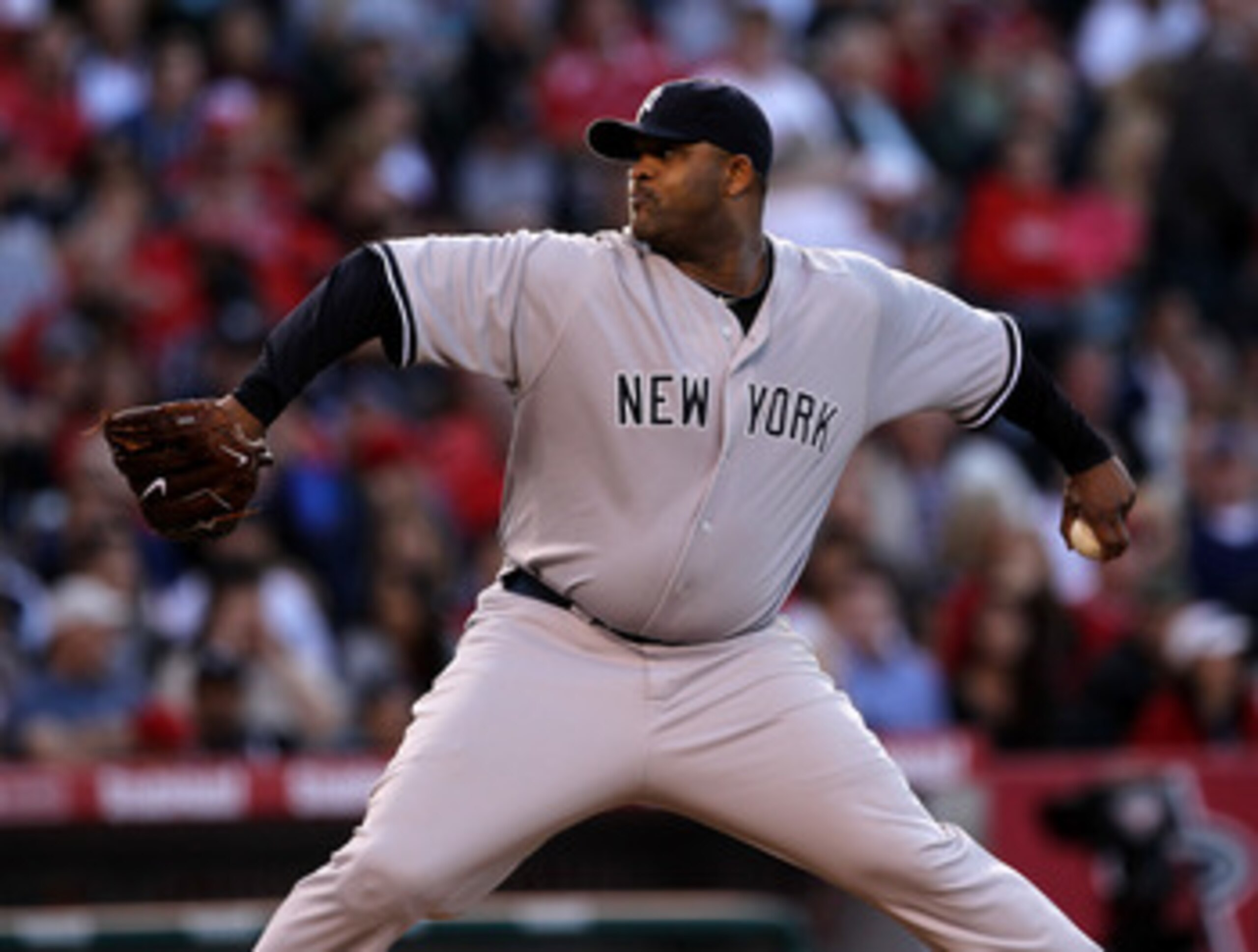 ANAHEIM, CA - JUNE 04:  CC Sabathia #55 of the New York Yankees throws a pitch against the Los Angeles Angels of Anaheim on June 4, 2011 at Angel Stadium in Anaheim, California.  (Photo by Stephen Dunn/Getty Images)