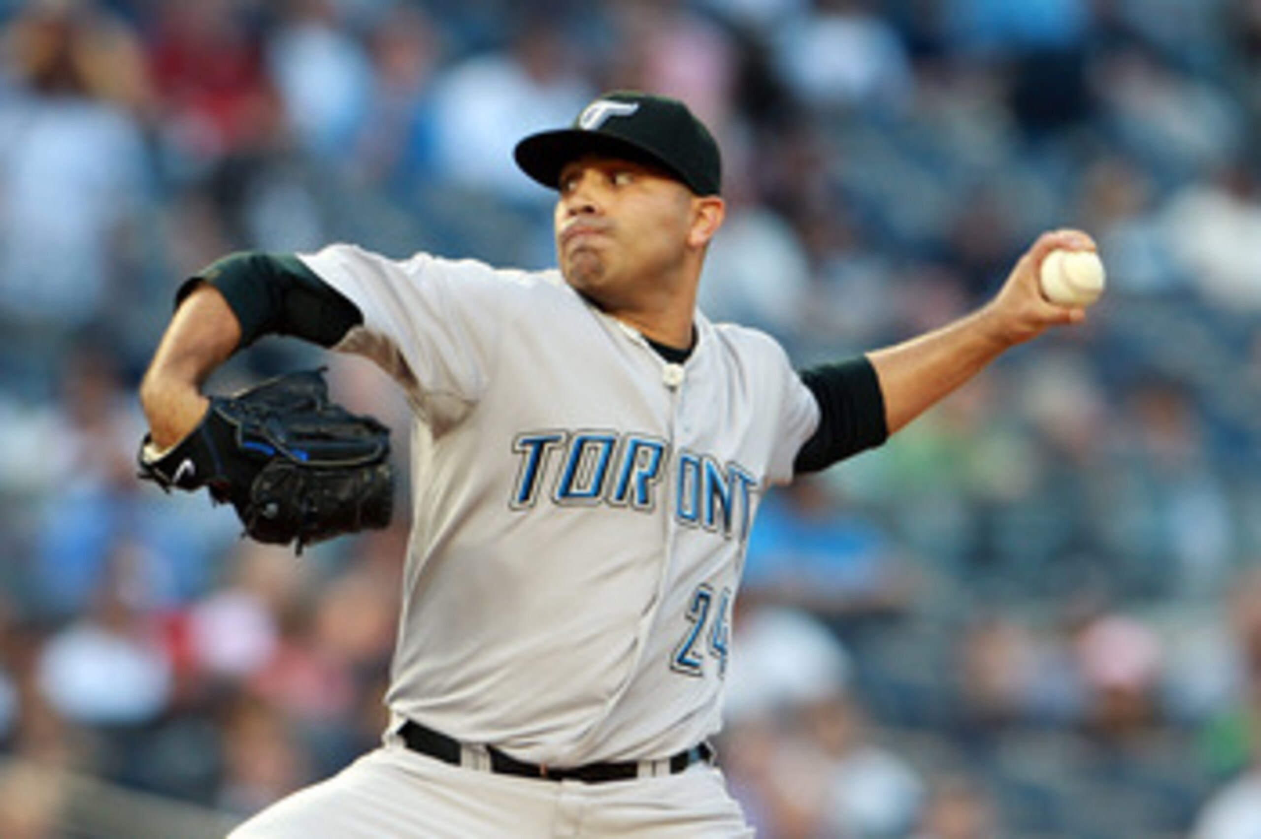 NEW YORK, NY - MAY 24:  Ricky Romero #24 of the Toronto Blue Jays pitches against the New York Yankees at Yankee Stadium on May 24, 2011 in the Bronx borough of New York City.  (Photo by Michael Heiman/Getty Images)