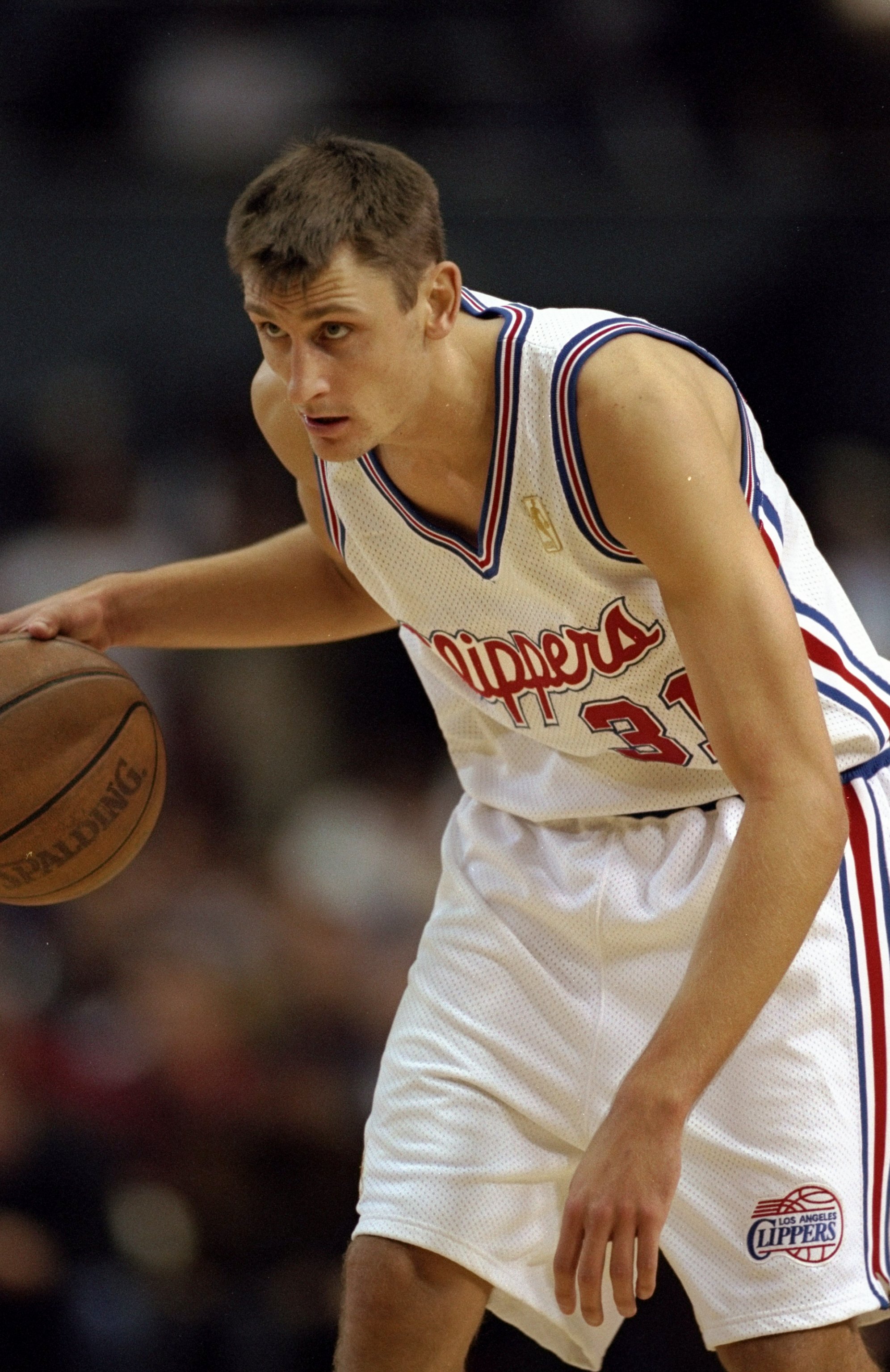 19 Dec 1996:  Guard Brent Barry of the Los Angeles Clippers in action against the Washington Bullets during a game at the Los Angeles Sports Arena in Los Angeles, California.  The Bullets defeated the Clippers 102-93. Mandatory Credit: Stephen Dunn  /Alls