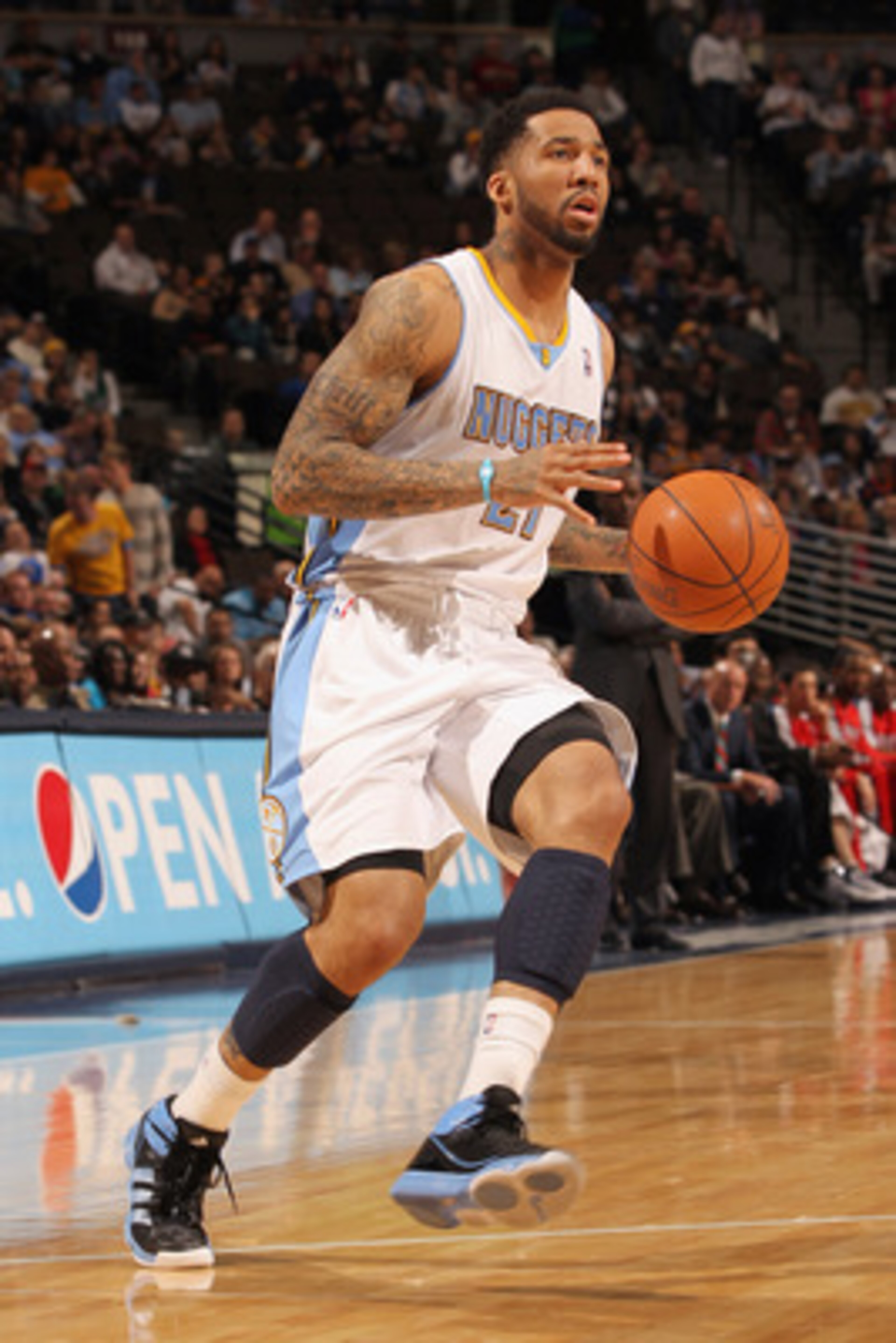 DENVER, CO - FEBRUARY 28:  Wilson Chandler #21 of the Denver Nuggets controls the ball against the Atlanta Hawks during NBA action at the Pepsi Center on February 28, 2011 in Denver, Colorado. The Nuggets deafeated the Hawks 100-90. NOTE TO USER: User exp