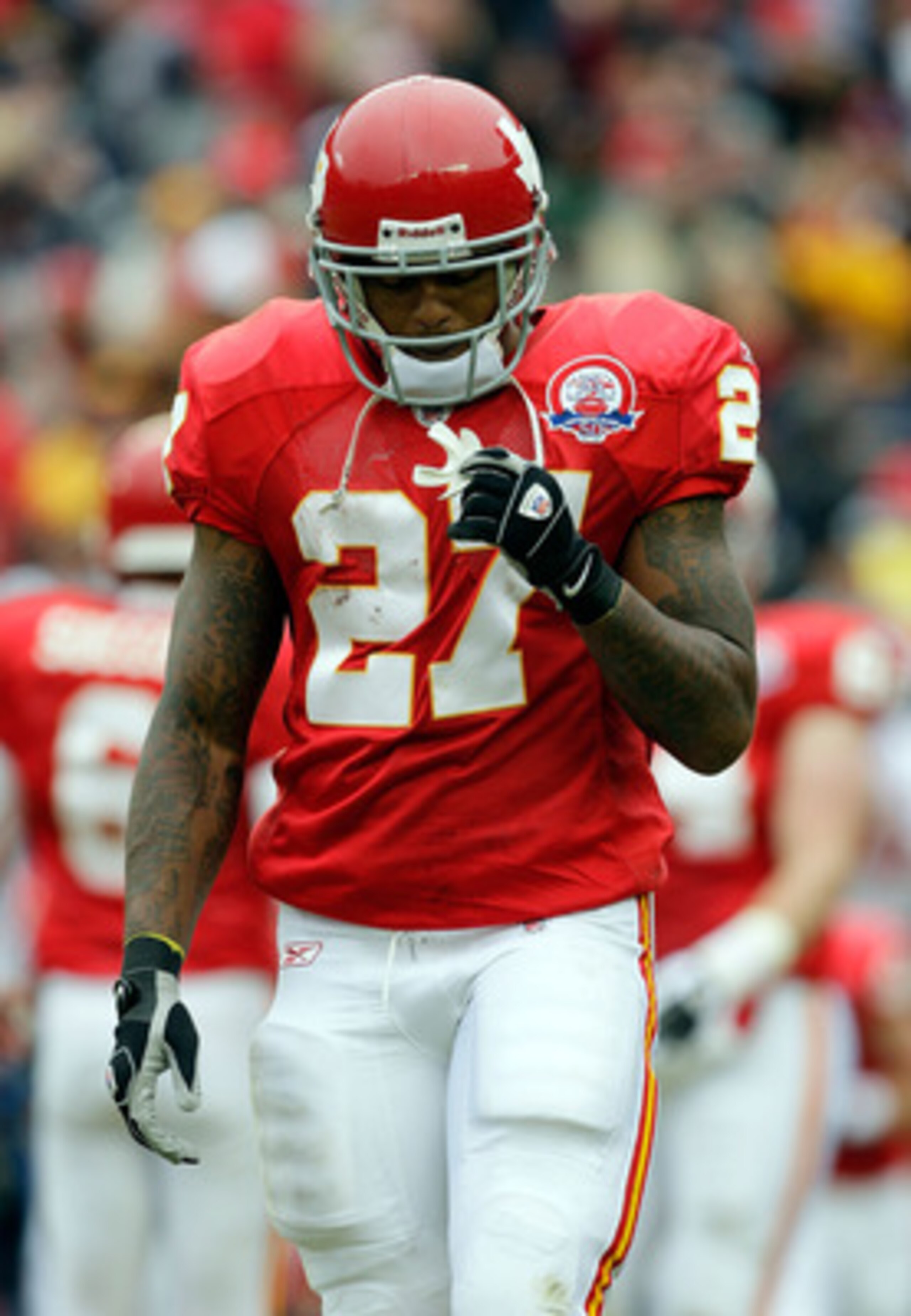 KANSAS CITY, MO - OCTOBER 11:  Running back Larry Johnson #27 of the Kansas City Chiefs walks off the field during the game against the Dallas Cowboys on October 11, 2009 at Arrowhead Stadium in Kansas City, Missouri.  (Photo by Jamie Squire/Getty Images)