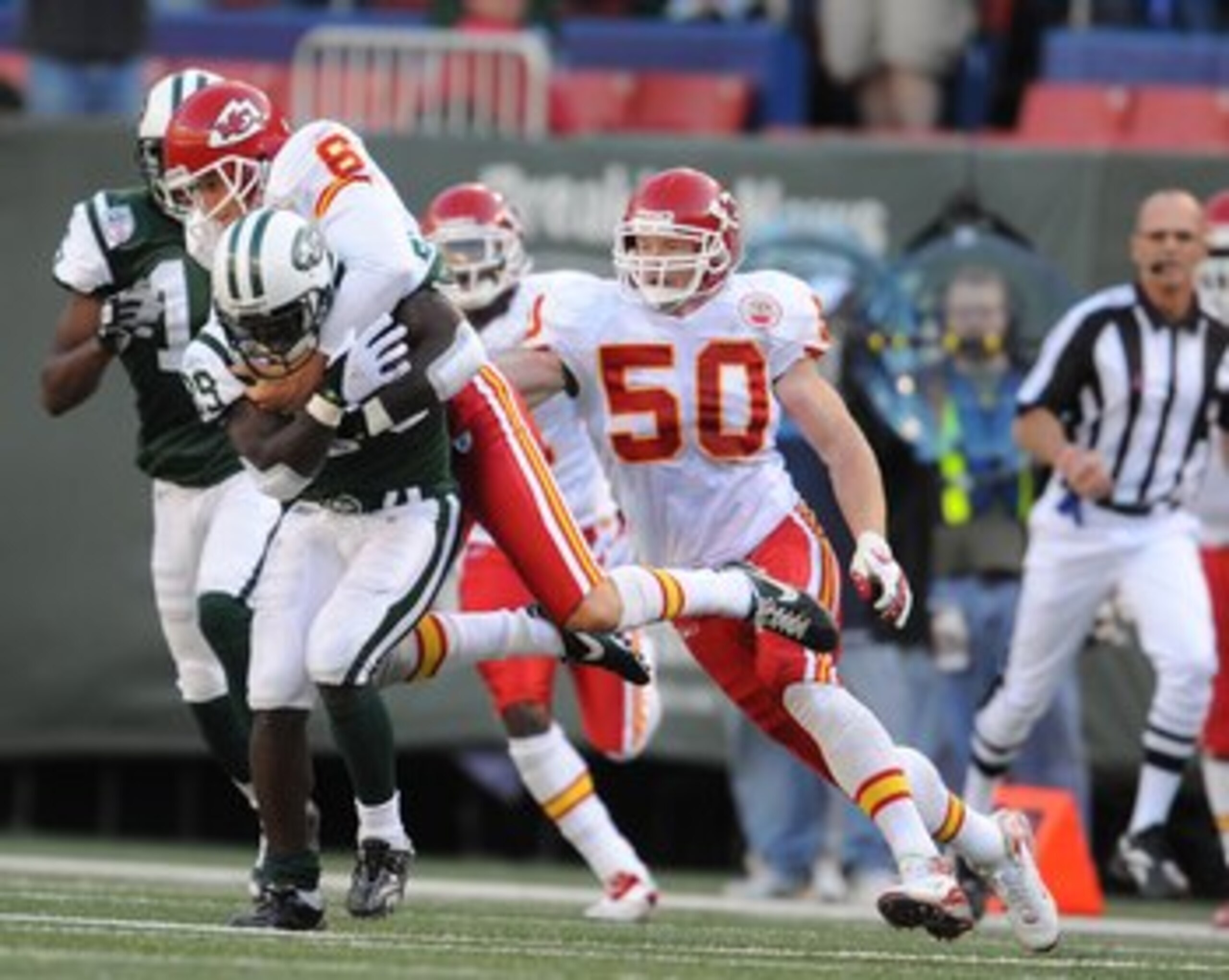 EAST RUTHERFORD, NJ - OCTOBER 26:  Steve Weatherford #6 of the Kansas City Chiefs tackles Leon Washington of the New York Jets on a punt return during their game on October 26, 2008 at Giants Stadium in East Rutherford, New Jersey.  (Photo by Al Bello/Get