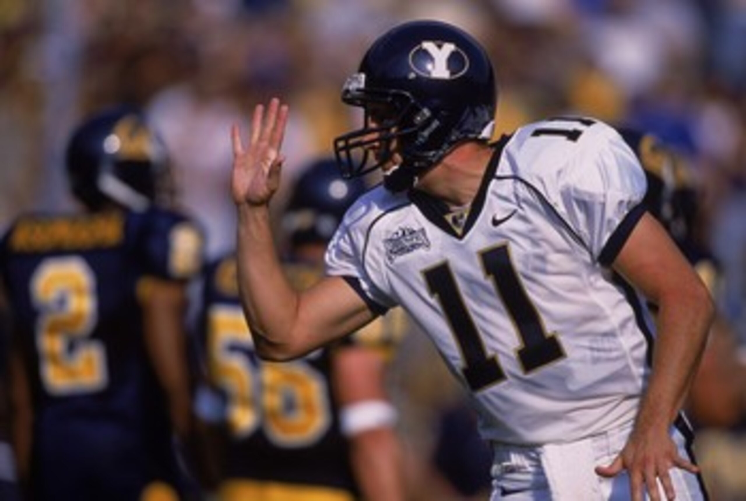 8 Sep 2001:  Quarterback Brandon Doman #11 of the Brigham Young Cougars gesturing during the game against the California Bears at Memorial Stadium in Berkeley, California. The Cougars defeated the Bears 44-16.Mandatory Credit: Jed Jacobsohn  /Allsport