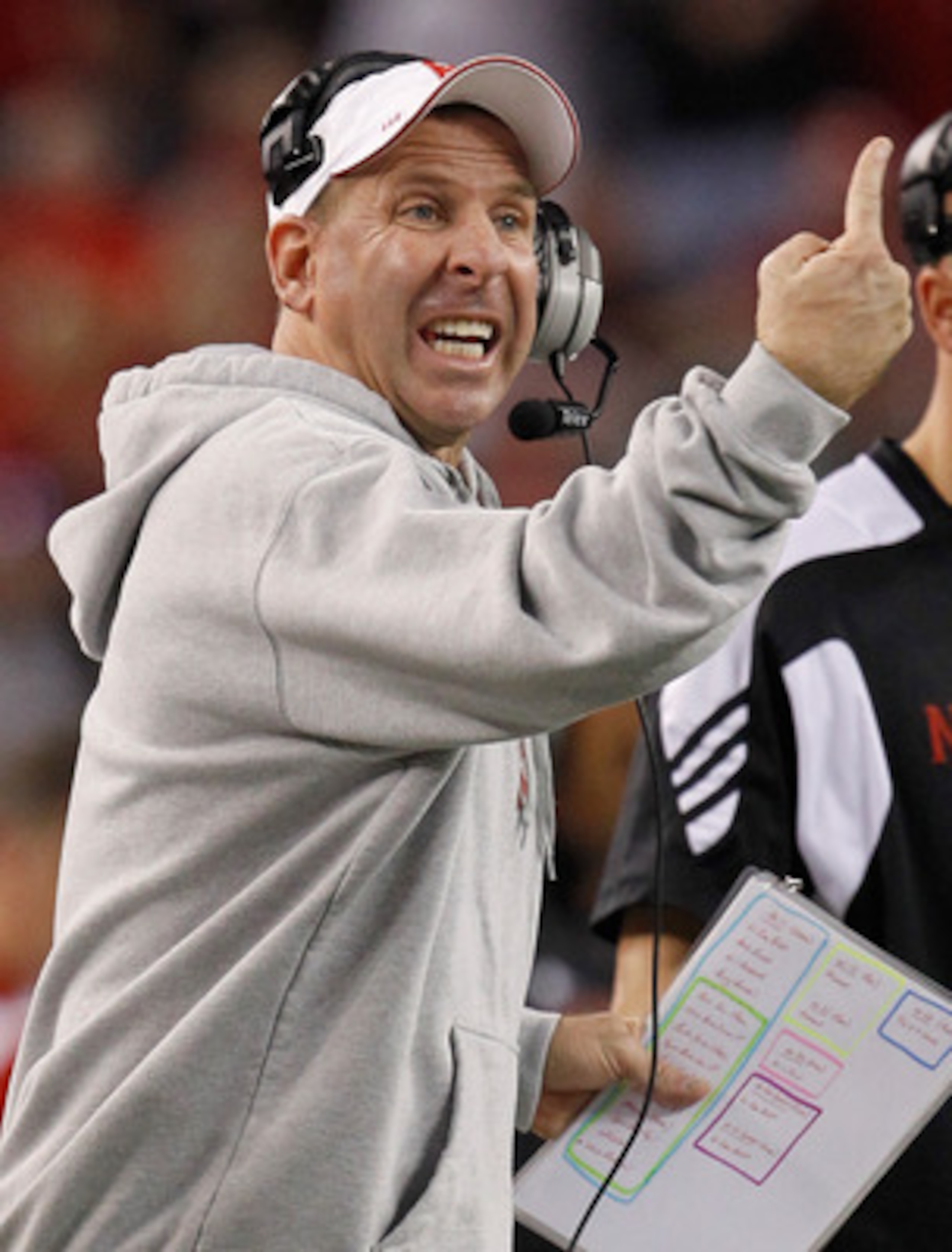 ARLINGTON, TX - DECEMBER 04:  Head coach Bo Pelini of the Nebraska Cornhuskers leads his team against the Oklahoma Sooners at Cowboys Stadium on December 4, 2010 in Arlington, Texas. The Sooners beat the Cornhuskers 23-20.  (Photo by Tom Pennington/Getty 