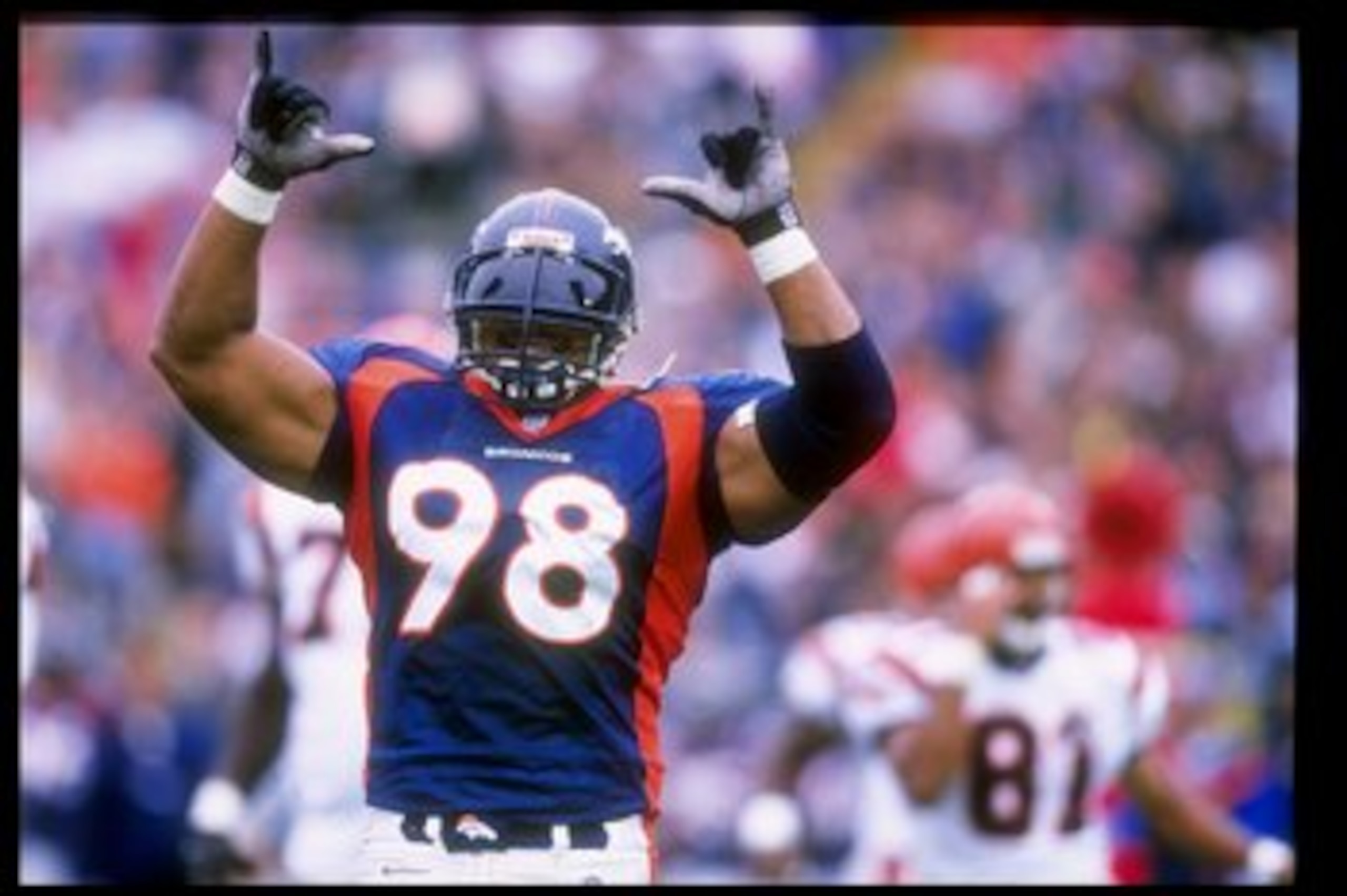 21 Sep 1997: Defensive lineman Maa Tanuvasa #98 of the Denver Broncos celebrates during the Broncos 38-20 win over the Cincinnati Bengals at Mile High Stadium in Denver, Colorado. Mandatory Credit: Stephen Dunn /Allsport 21 Sep 1997: Defensive lineman Maa Tanuvasa #98 of the Denver Broncos celebrates during the Broncos 38-20 win over the Cincinnati Bengals at Mile High Stadium in Denver, Colorado. Mandatory Credit: Stephen Dunn /Allsport