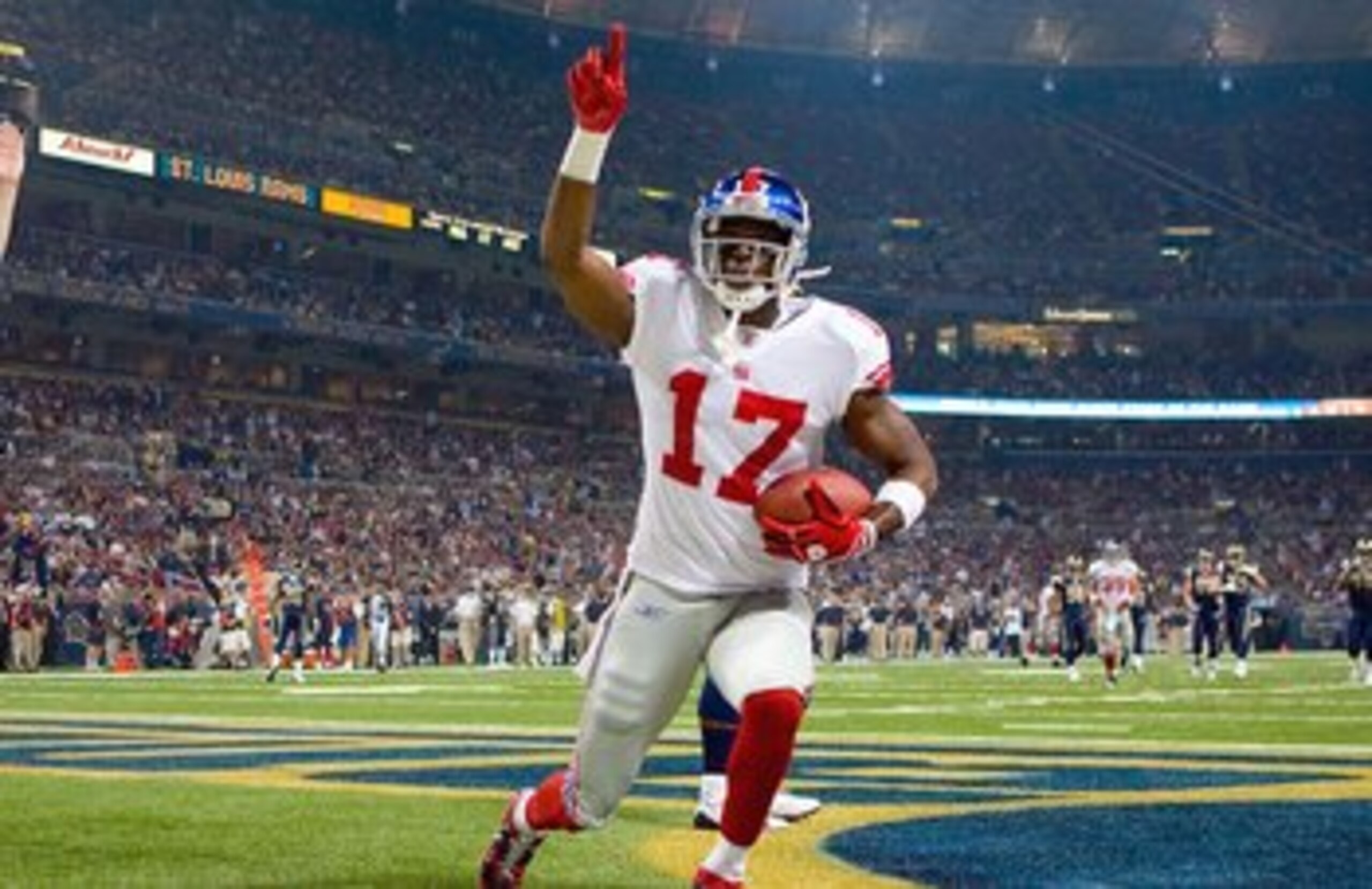 ST. LOUIS, MO - SEPTEMBER 14: Plaxico Buress #17 of the New York Giants celebrates a touchdown against the St. Louis Rams at the Edward Jones Dome on September 14, 2008 in St. Louis, Missouri. (Photo by Dilip Vishwanat/Getty Images)