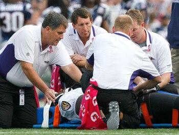 FOXBORO, MA - OCTOBER 4:  Jared Gaither #71 of the Baltimore Ravens is aided after he was injured during a game with the New England Patriots at Gillette Stadium on October 4, 2009 in Foxboro, Massachusetts. Gaither was taken off the field in a stretcher.