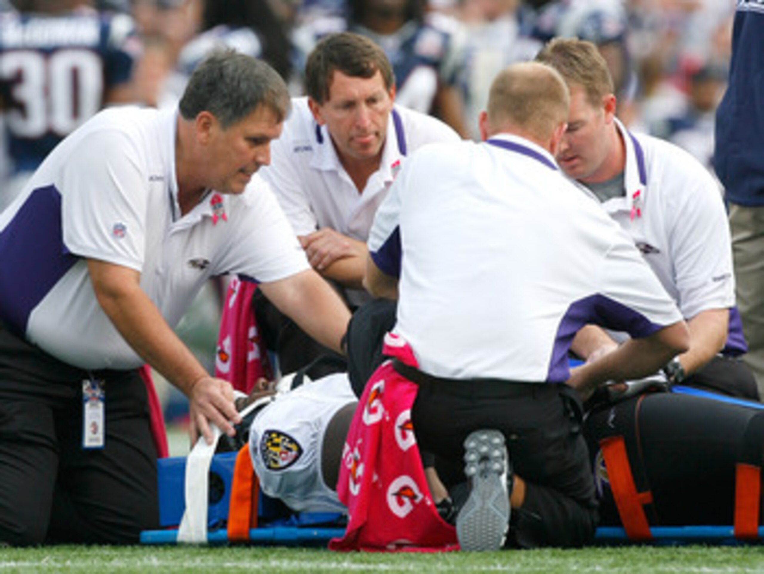 FOXBORO, MA - OCTOBER 4:  Jared Gaither #71 of the Baltimore Ravens is aided after he was injured during a game with the New England Patriots at Gillette Stadium on October 4, 2009 in Foxboro, Massachusetts. Gaither was taken off the field in a stretcher.