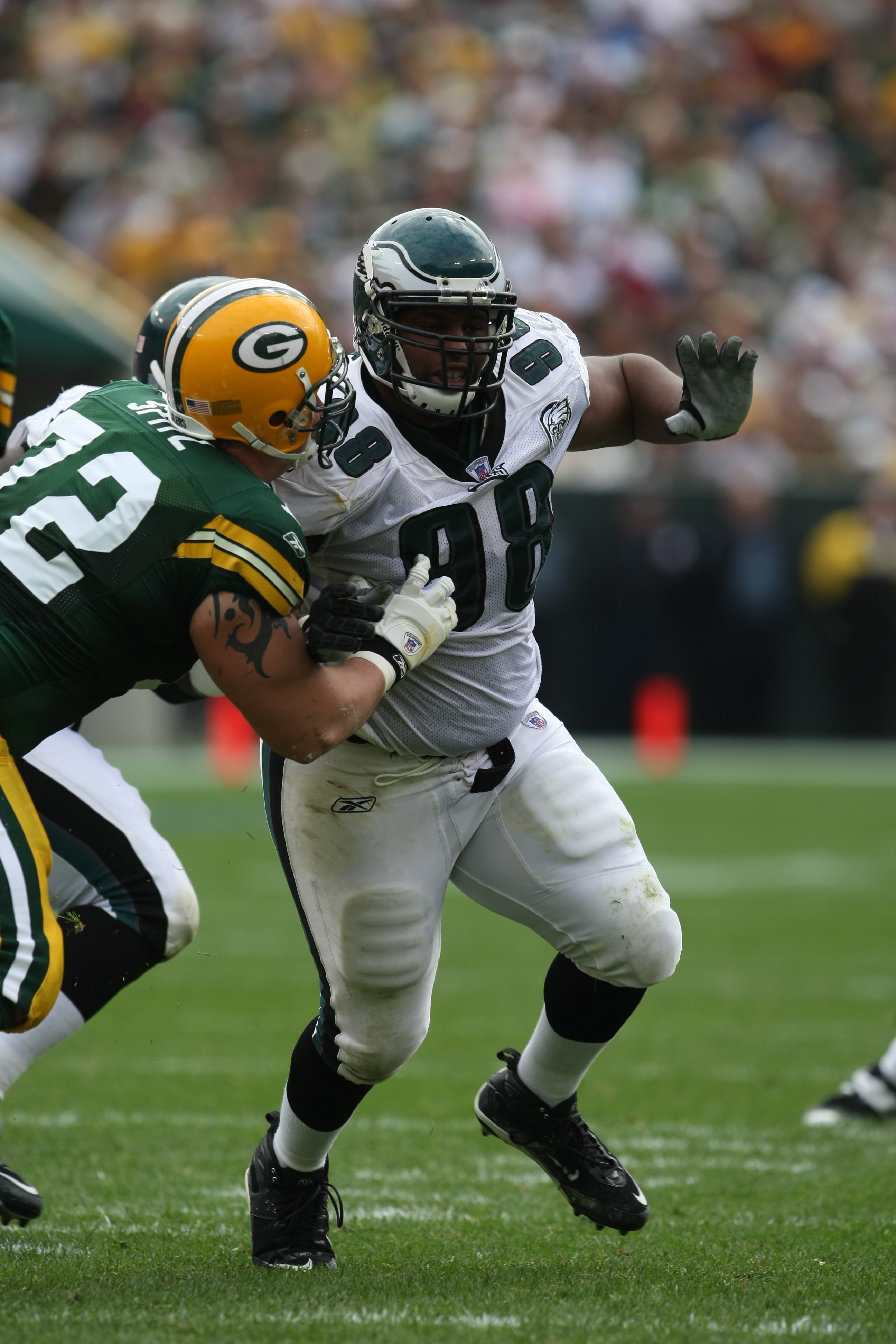 GREEN BAY, WI - SEPTEMBER 09: Mike Patterson #98 of the Philadelphia Eagles r ushes against Jason Spitz #72 of the Green Bay Packerson September 9, 2007 at Lambeau Field in Green Bay, Wisconsin. The Packers defeated the Eagles 16-13. (Photo by Jonathan Da