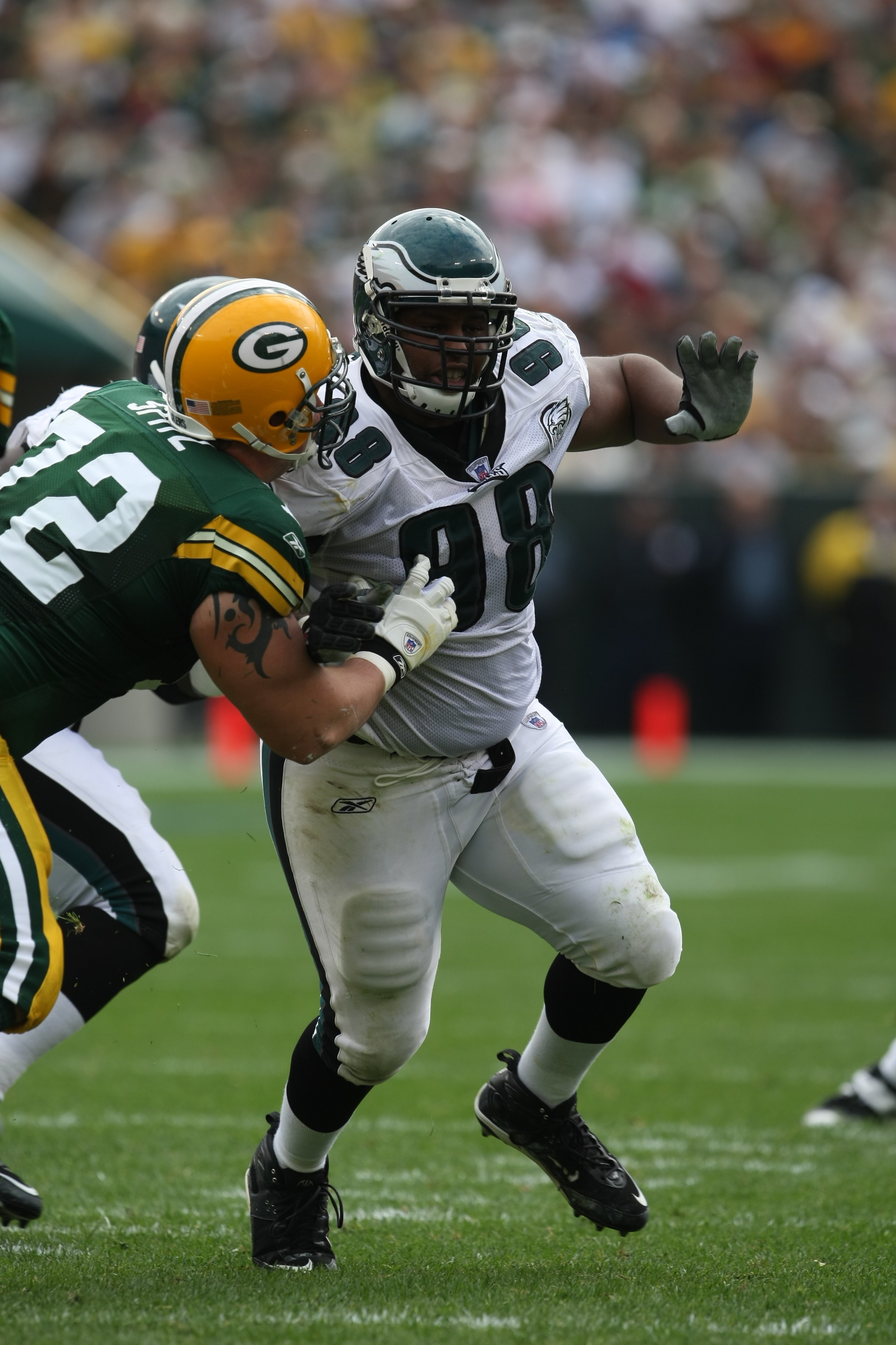 GREEN BAY, WI - SEPTEMBER 09: Mike Patterson #98 of the Philadelphia Eagles r ushes against Jason Spitz #72 of the Green Bay Packerson September 9, 2007 at Lambeau Field in Green Bay, Wisconsin. The Packers defeated the Eagles 16-13. (Photo by Jonathan Da