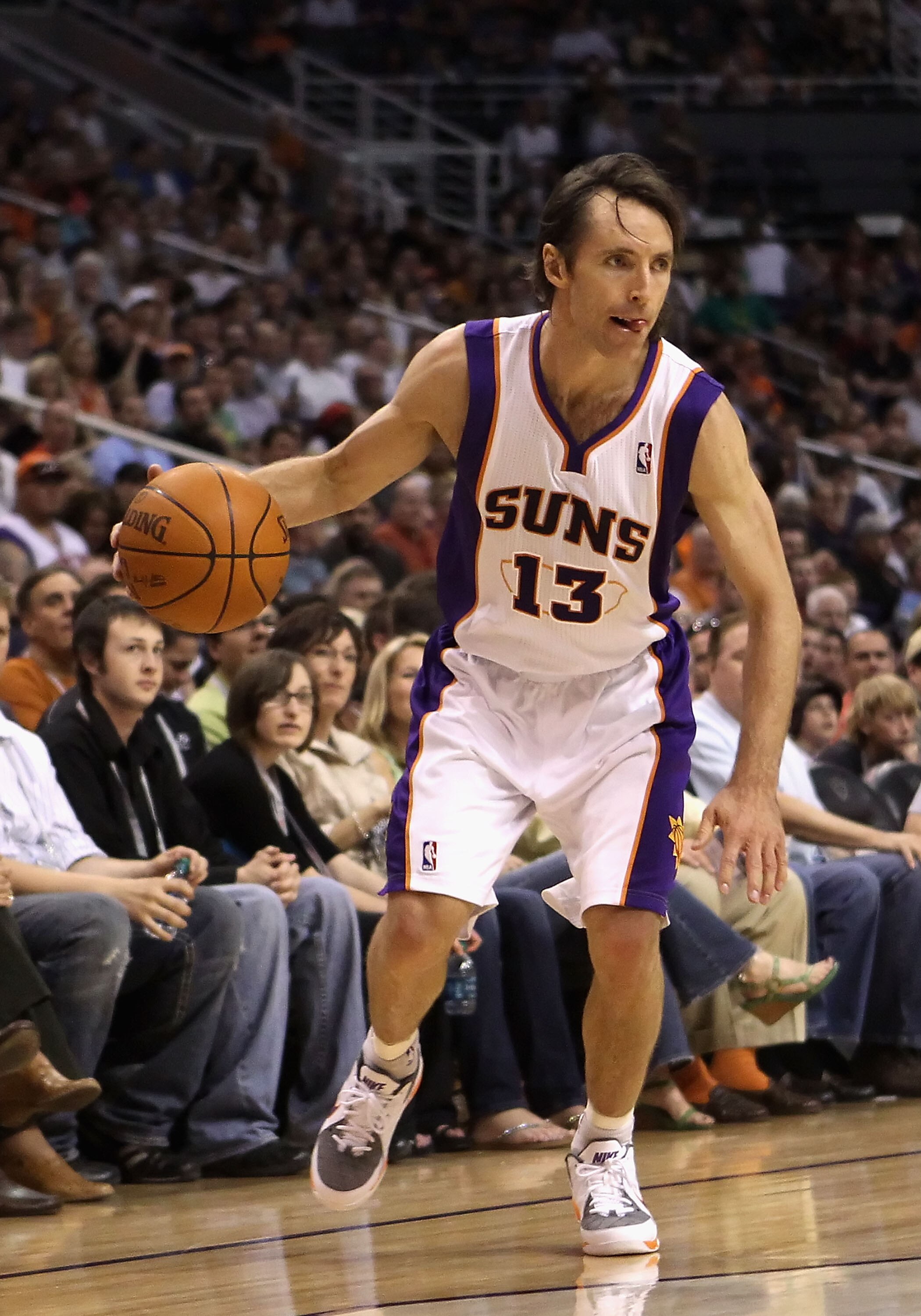 PHOENIX, AZ - MARCH 30: Steve Nash #13 of the Phoenix Suns handles the ball during the NBA game against the Oklahoma City Thunder at US Airways Center on March 30, 2011 in Phoenix, Arizona. The Thunder defeated the Suns 116-98. NOTE TO USER: User expres PHOENIX, AZ - MARCH 30: Steve Nash #13 of the Phoenix Suns handles the ball during the NBA game against the Oklahoma City Thunder at US Airways Center on March 30, 2011 in Phoenix, Arizona. The Thunder defeated the Suns 116-98. NOTE TO USER: User expres