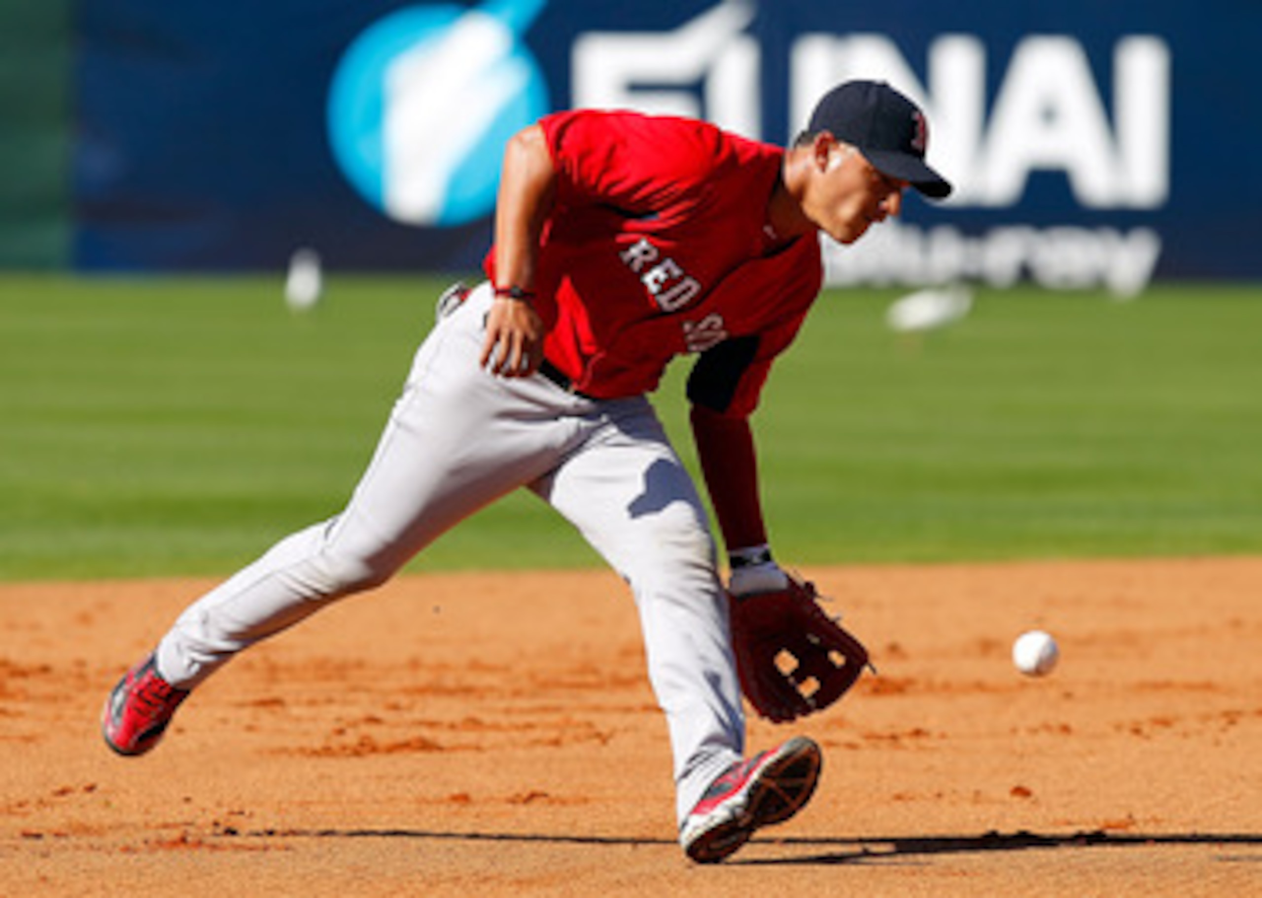 FORT MYERS, FL - FEBRUARY 19:  Infielder Jose Iglesias #76 of the Boston Red Sox fields a ground ball during a Spring Training Workout Session at the Red Sox Player Development Complex on February 19, 2011 in Fort Myers, Florida.  (Photo by J. Meric/Getty