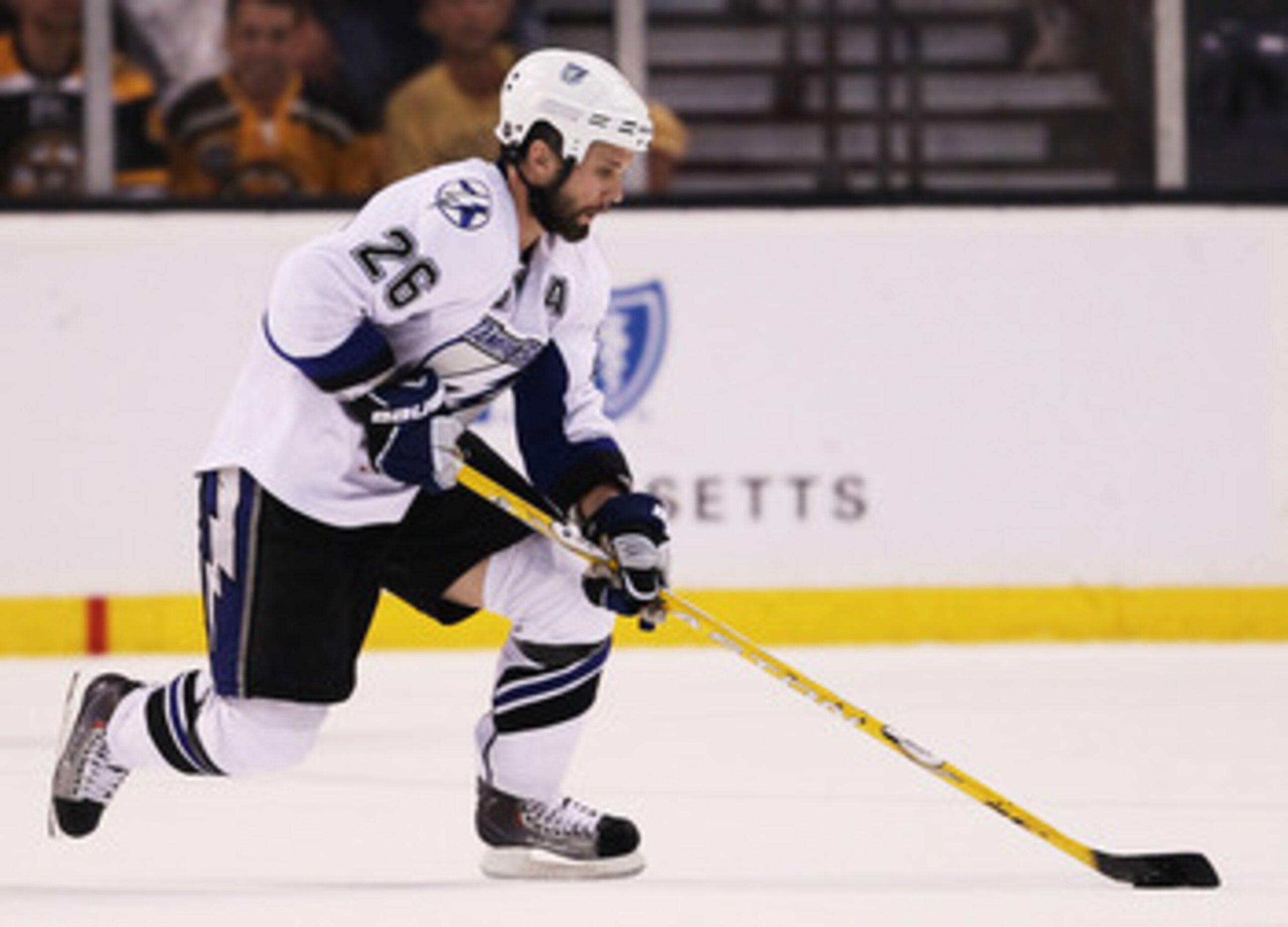 BOSTON, MA - MAY 27:  Martin St. Louis #26 of the Tampa Bay Lightning controls the puck against the Boston Bruins in Game Seven of the Eastern Conference Finals during the 2011 NHL Stanley Cup Playoffs at TD Garden on May 27, 2011 in Boston, Massachusetts