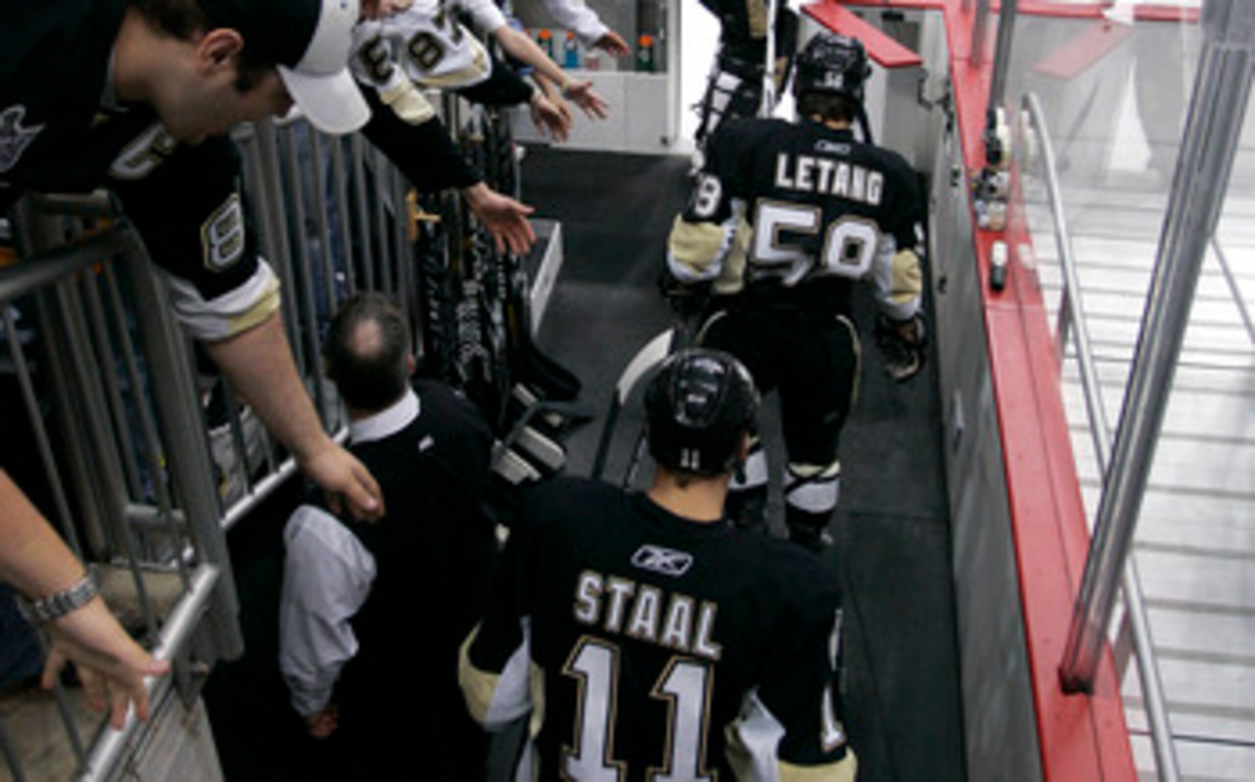 PITTSBURGH, PA - APRIL 23:  Jordan Staal #11, Kris Letang #58, and Brent Johnson #1 of the Pittsburgh Penguins take the ice for warm ups before the start of Game Five of the Eastern Conference Quarterfinals against the Tampa Bay Lightning during the 2011