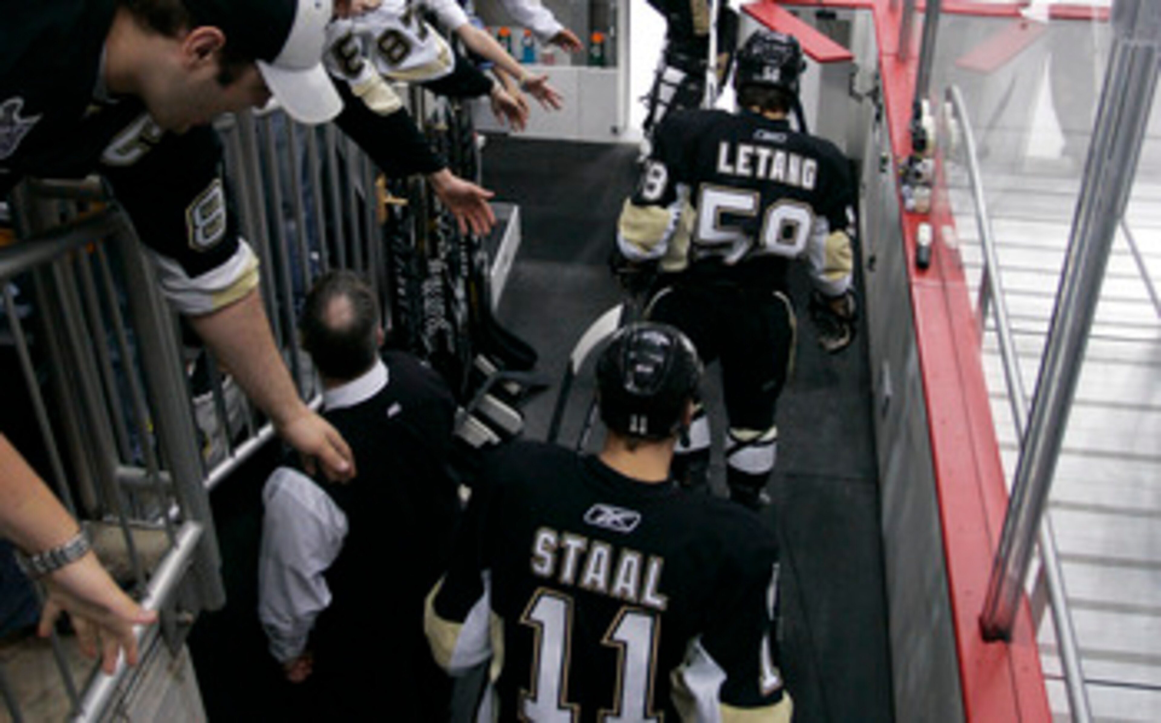 PITTSBURGH, PA - APRIL 23:  Jordan Staal #11, Kris Letang #58, and Brent Johnson #1 of the Pittsburgh Penguins take the ice for warm ups before the start of Game Five of the Eastern Conference Quarterfinals against the Tampa Bay Lightning during the 2011