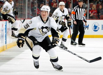 NEWARK, NJ - JANUARY 20:  Arron Asham #45 of the Pittsburgh Penguins skates during an NHL hockey game against the New Jersey Devils at the Prudential Center on January 20, 2011 in Newark, New Jersey.  (Photo by Paul Bereswill/Getty Images)