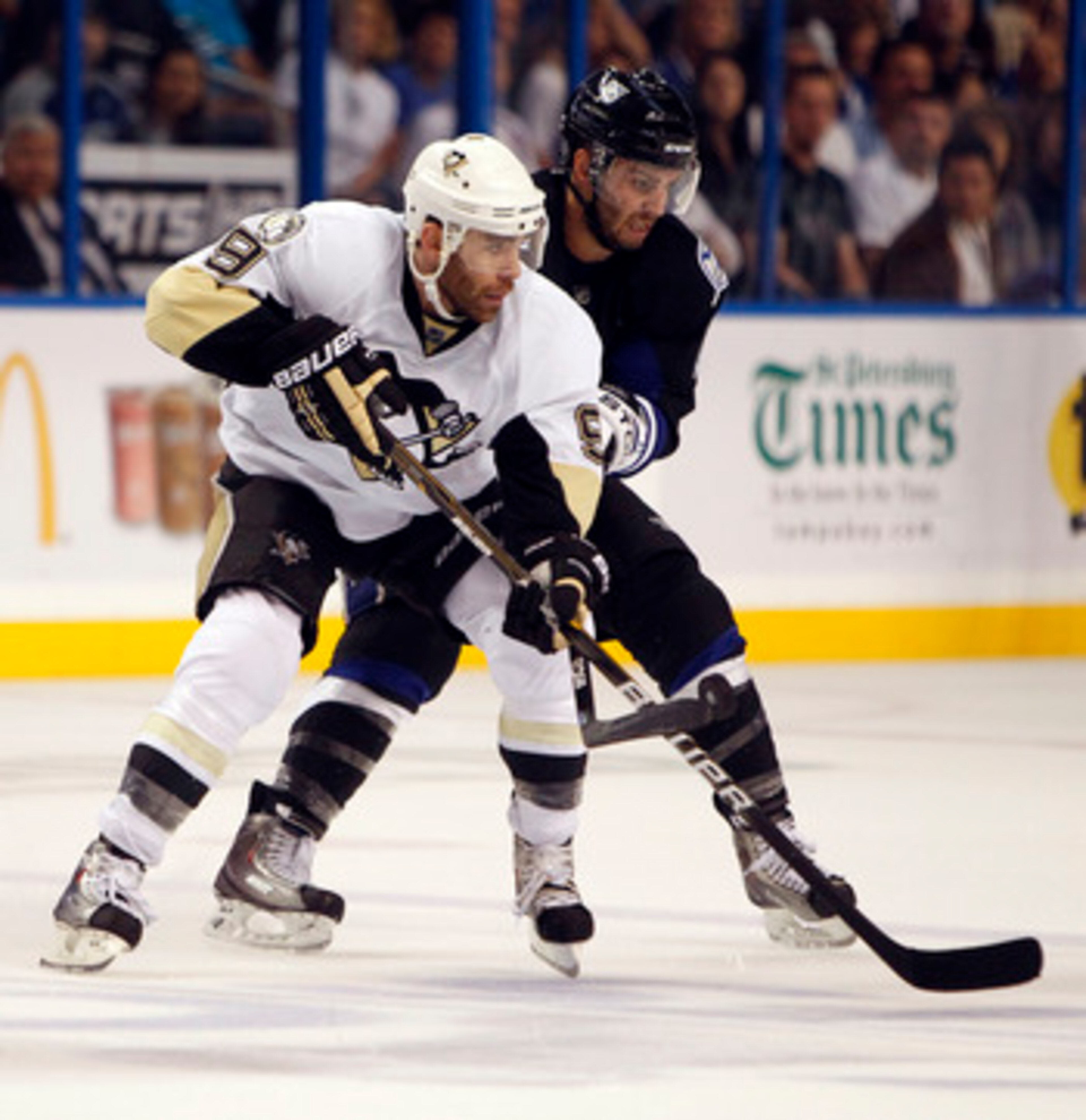 TAMPA, FL - APRIL 25: Pascal Dupuis #9 of the Pittsburgh Penguins skates with the puck against Teddy Purcell #16 of the Tampa Bay Lightning in Game Six of the Eastern Conference Quarterfinals during the 2011 NHL Stanley Cup Playoffs at the St. Pete Times