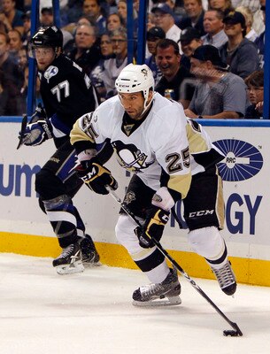 TAMPA, FL - APRIL 20: Maxime Talbot #25 of the Pittsburgh Penguins skates with the puck against the Tampa Bay Lightning in Game Four of the Eastern Conference Quarterfinals during the 2011 NHL Stanley Cup Playoffs at the St. Pete Times Forum on April 20,