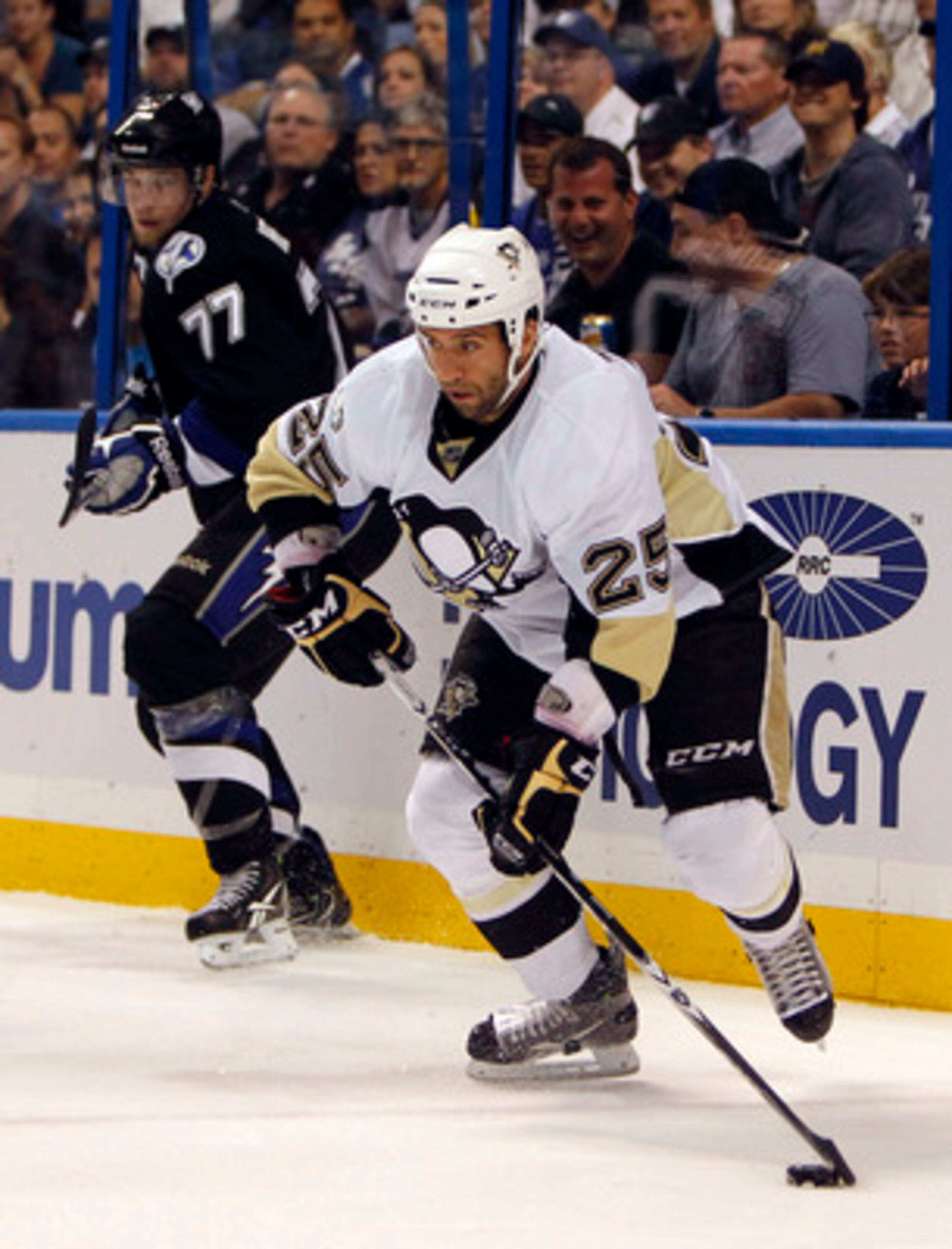 TAMPA, FL - APRIL 20: Maxime Talbot #25 of the Pittsburgh Penguins skates with the puck against the Tampa Bay Lightning in Game Four of the Eastern Conference Quarterfinals during the 2011 NHL Stanley Cup Playoffs at the St. Pete Times Forum on April 20,