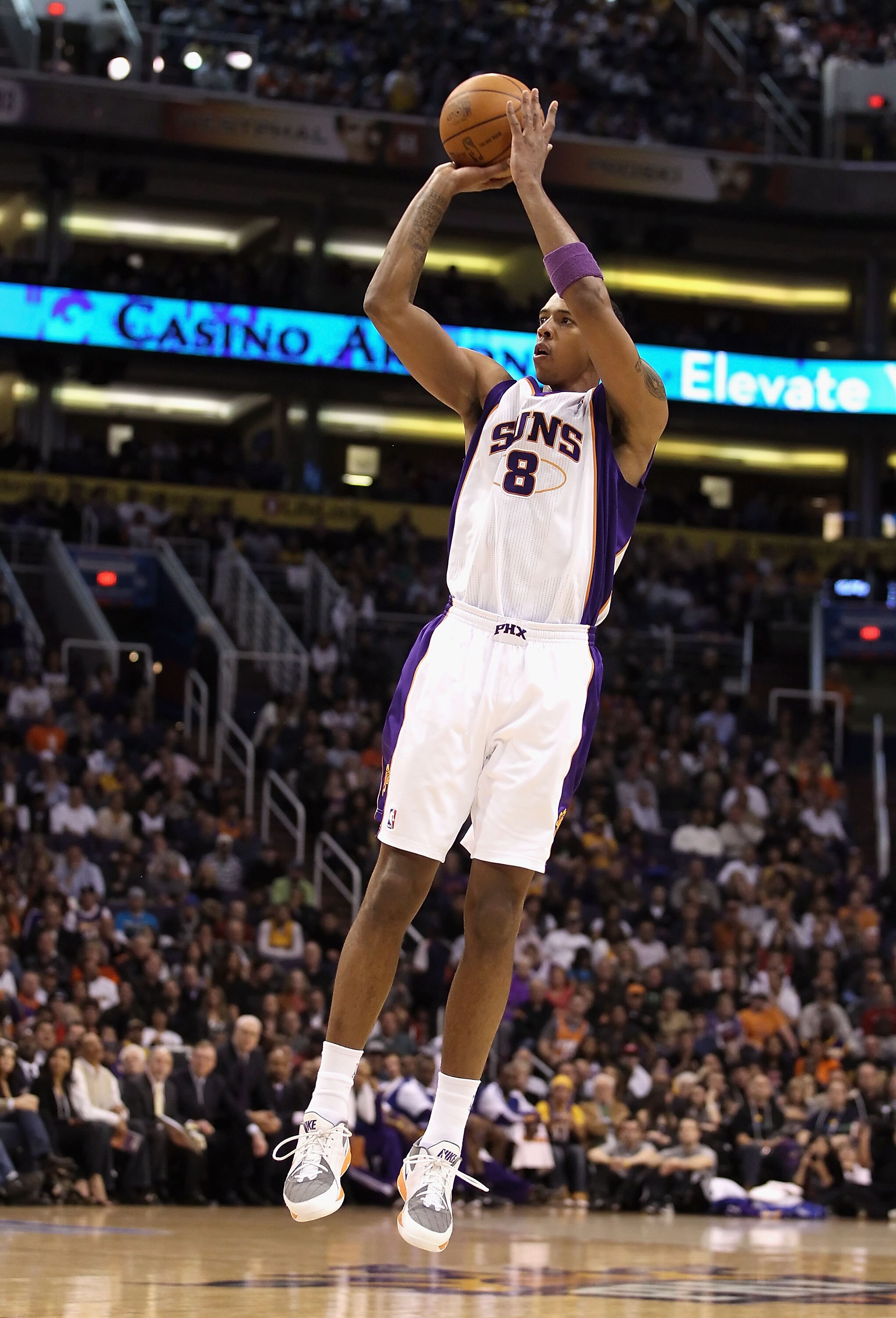 PHOENIX, AZ - JANUARY 05: Channing Frye #8 of the Phoenix Suns puts up a shot during the NBA game against the Los Angeles Lakers at US Airways Center on January 5, 2011 in Phoenix, Arizona. The Lakers defeated the Suns 99-95. NOTE TO USER: User expressl PHOENIX, AZ - JANUARY 05: Channing Frye #8 of the Phoenix Suns puts up a shot during the NBA game against the Los Angeles Lakers at US Airways Center on January 5, 2011 in Phoenix, Arizona. The Lakers defeated the Suns 99-95. NOTE TO USER: User expressl