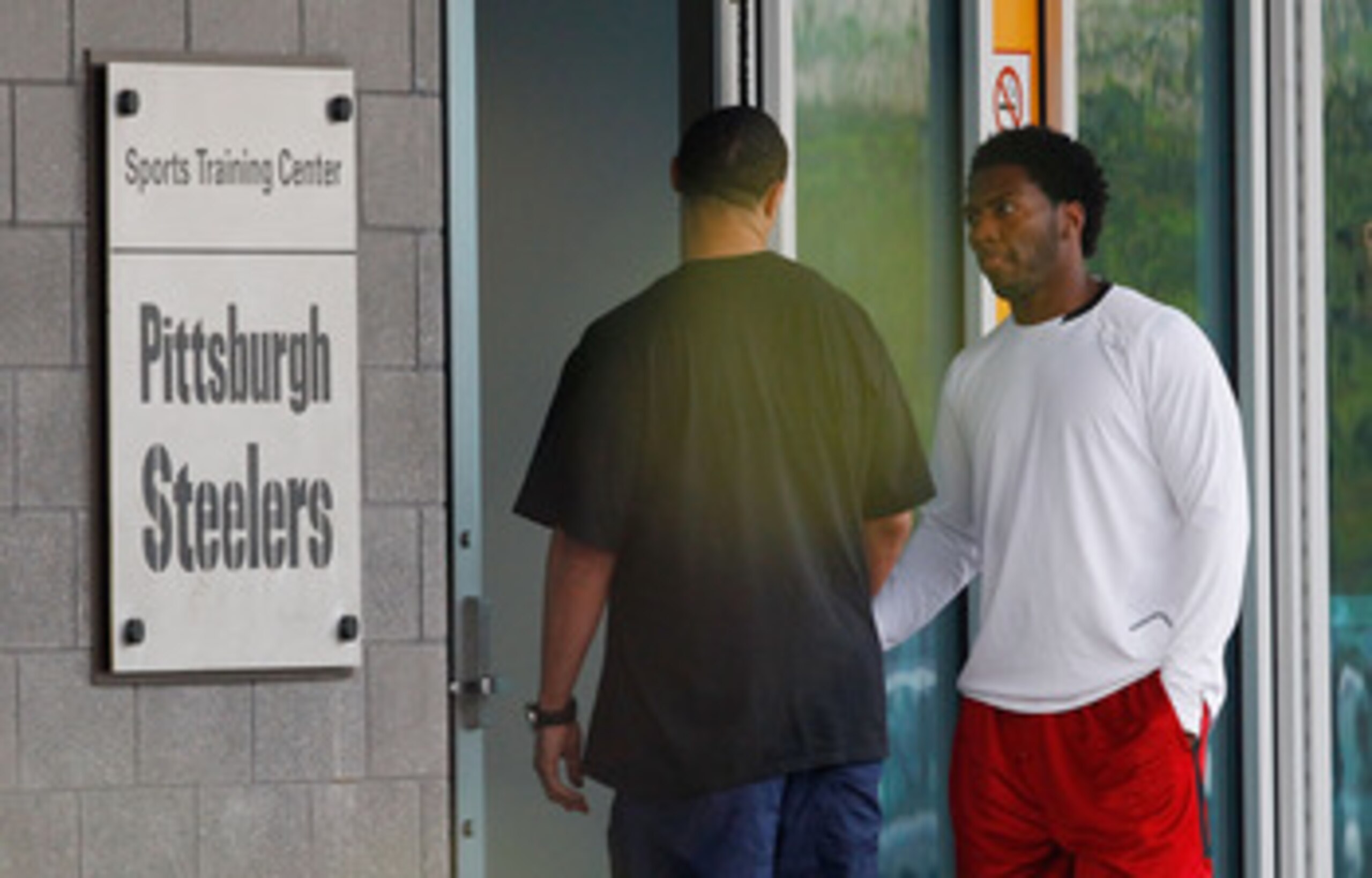 PITTSBURGH - APRIL 26:  A day after the NFL lockout was lifted, Charlie Batch #16 and Ryan Clark #25 of the Pittsburgh Steelers report to the South Side training facility on April 26, 2011 in Pittsburgh, Pennsylvania.  (Photo by Jared Wickerham/Getty Imag