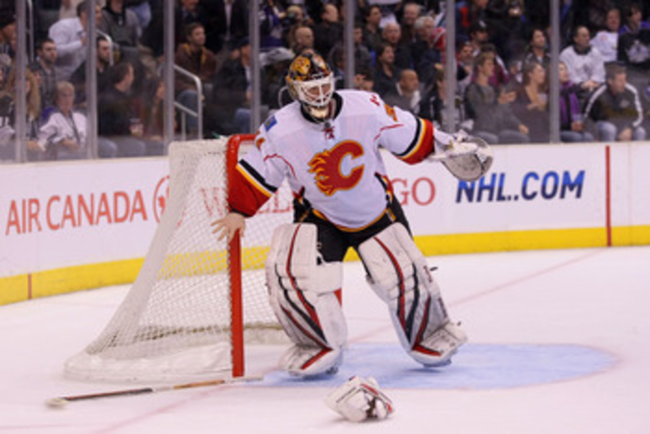 LOS ANGELES, CA - MARCH 21:  Goaltender Miikka Kiprusoff #34 of the Calgary Flames loses his stick and blocker during their NHL game against the Los Angeles Kings at Staples Center on March 21, 2011 in Los Angeles, California. The Kings defeated the Flame