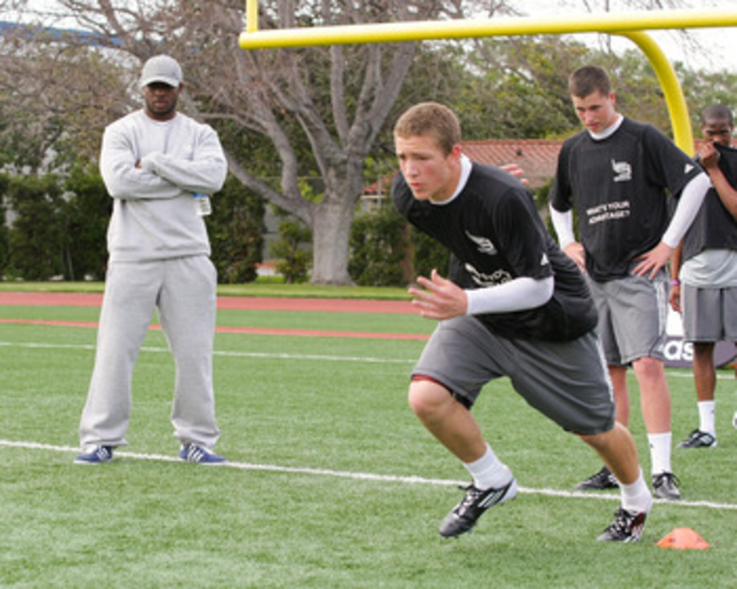 LOS ANGELES, CA - MARCH 19:  adidas and Reggie Bush pop into a football practice in Los Angeles to capture game faces as part of the adidas Facebook Game Face contest.  (Photo by Noel Vasquez/Getty Images for adidas)