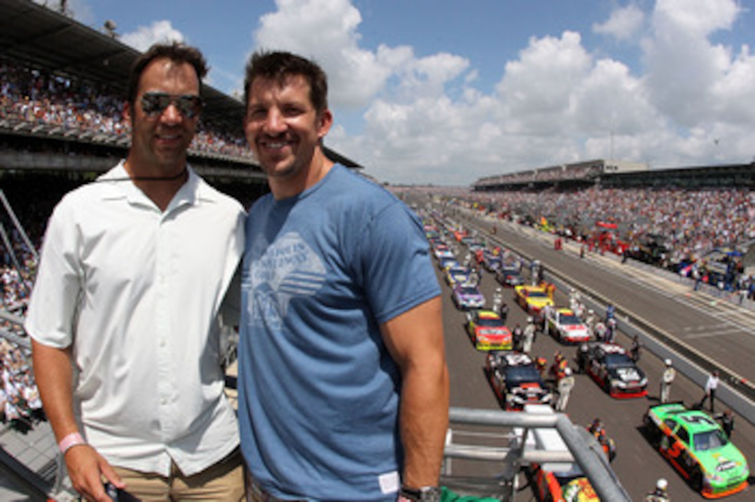 INDIANAPOLIS - JULY 25:  (R-L) Dallas Clark of the NFL's Indianapolis Colts poses with brother Dan Clark in the flag stand before the NASCAR Sprint Cup Series Brickyard 400 at Indianapolis Motor Speedway on July 25, 2010 in Indianapolis, Indiana.  (Photo
