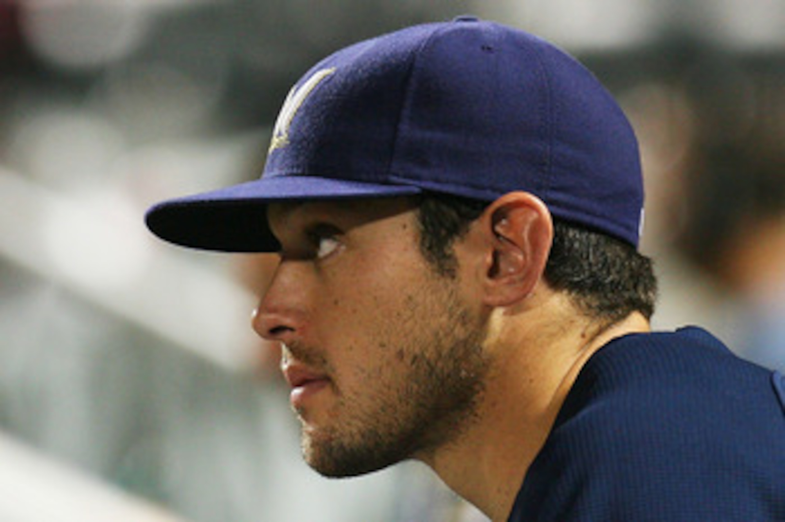 NEW YORK - SEPTEMBER 30:  Mark Rogers #37 of the Milwaukee Brewers watches their game against the New York Mets on September 30, 2010 at Citi Field in the Flushing neighborhood of the Queens borough of New York City. The Brewers defeated the Mets 9-2.(Pho