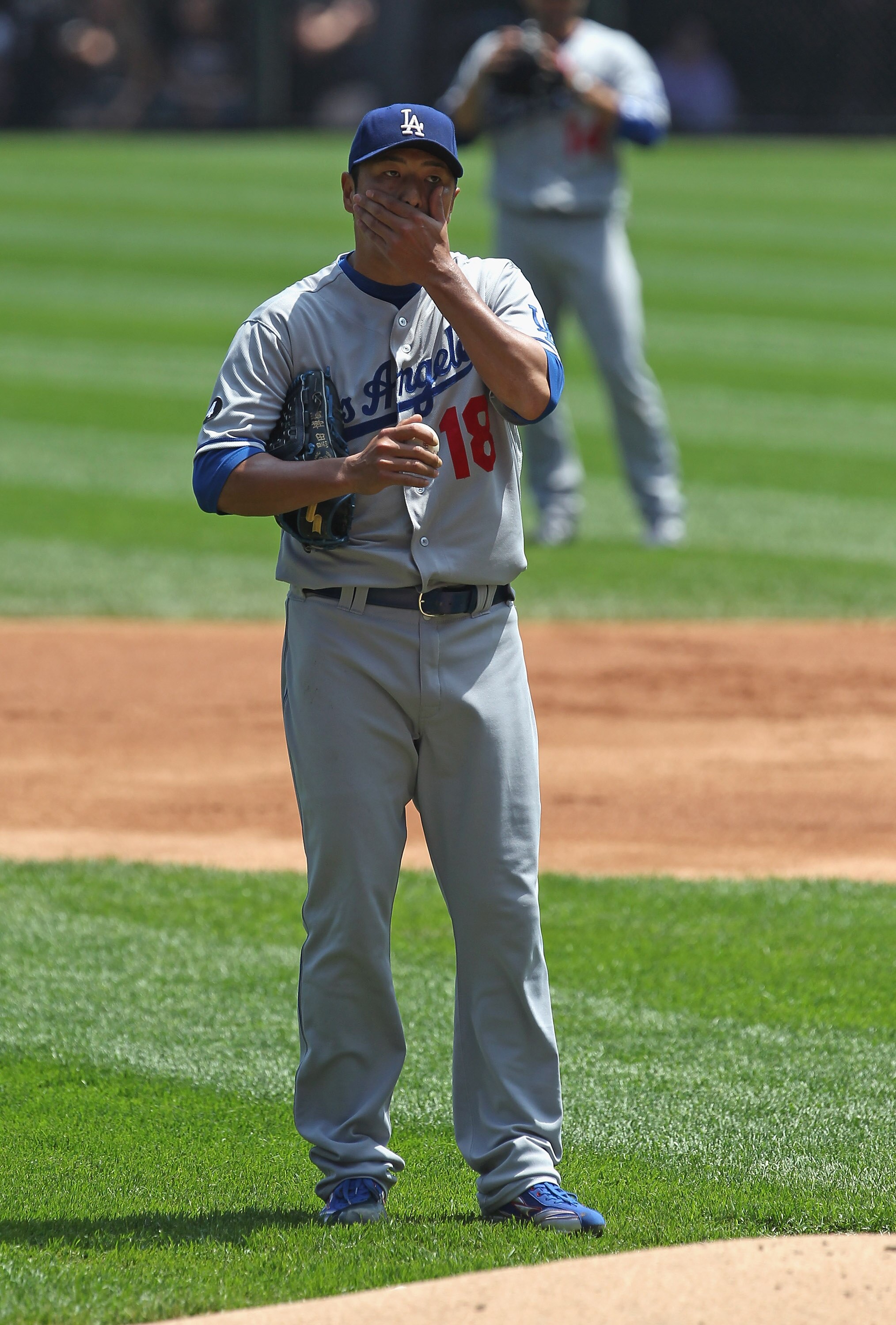 CHICAGO, IL - MAY 22: Starting pitcher Hiroki Kuroda #18 of the Los Angeles Dodgers reacts after giving up a 2nd home run in the 1st inning to the Chicago White Sox at U.S. Cellular Field on May 22, 2011 in Chicago, Illinois. (Photo by Jonathan Daniel/Get