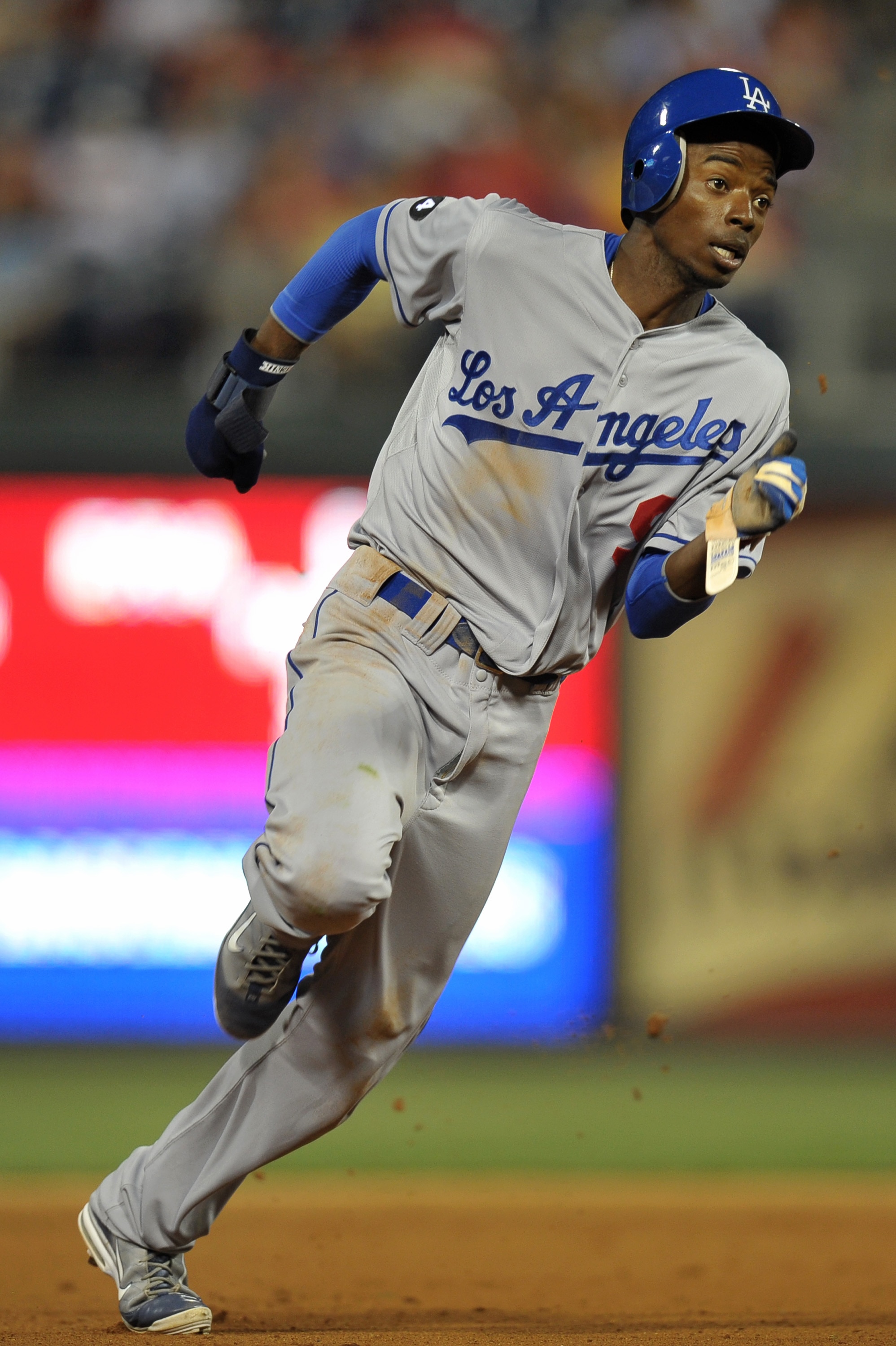 PHILADELPHIA, PA - JUNE 06: Dee Gordon #9 of the Los Angeles Dodgers runs to thrid base during the game against the Philadelphia Phillies at Citizens Bank Park on June 6, 2011 in Philadelphia, Pennsylvania. The Phillies won 3-1. (Photo by Drew Hallowell/G