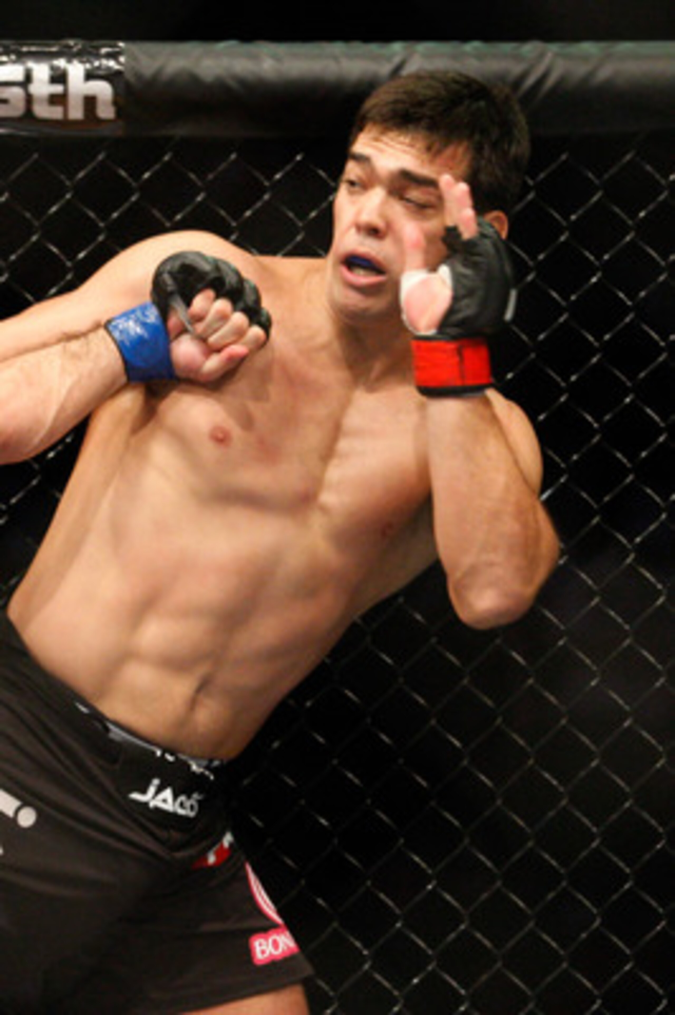 MONTREAL- MAY 8: Mauricio 'Shogun' Rua (L) punches Lyoto Machida in their light heavyweight bout at UFC 113 at Bell Centre on May 8, 2010 in Montreal, Quebec, Canada.  (Photo by Richard Wolowicz/Getty Images)