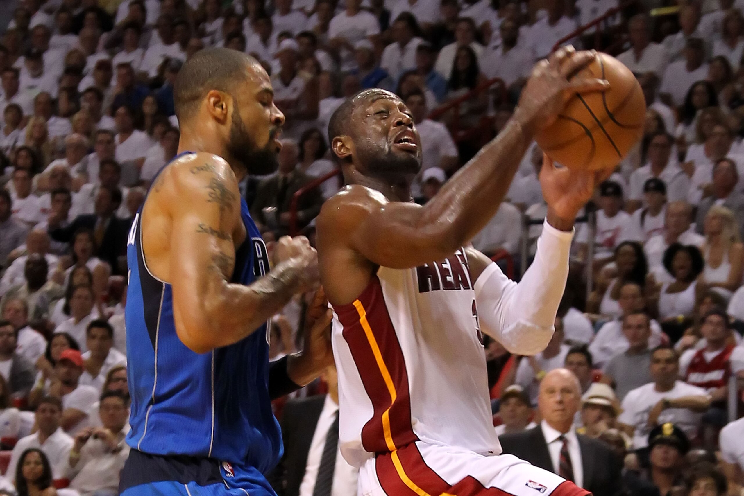 MIAMI, FL - JUNE 02:  Dwyane Wade #3 of the Miami Heat drives against Tyson Chandler #6 of the Dallas Mavericks in Game Two of the 2011 NBA Finals at American Airlines Arena on June 2, 2011 in Miami, Florida. NOTE TO USER: User expressly acknowledges and