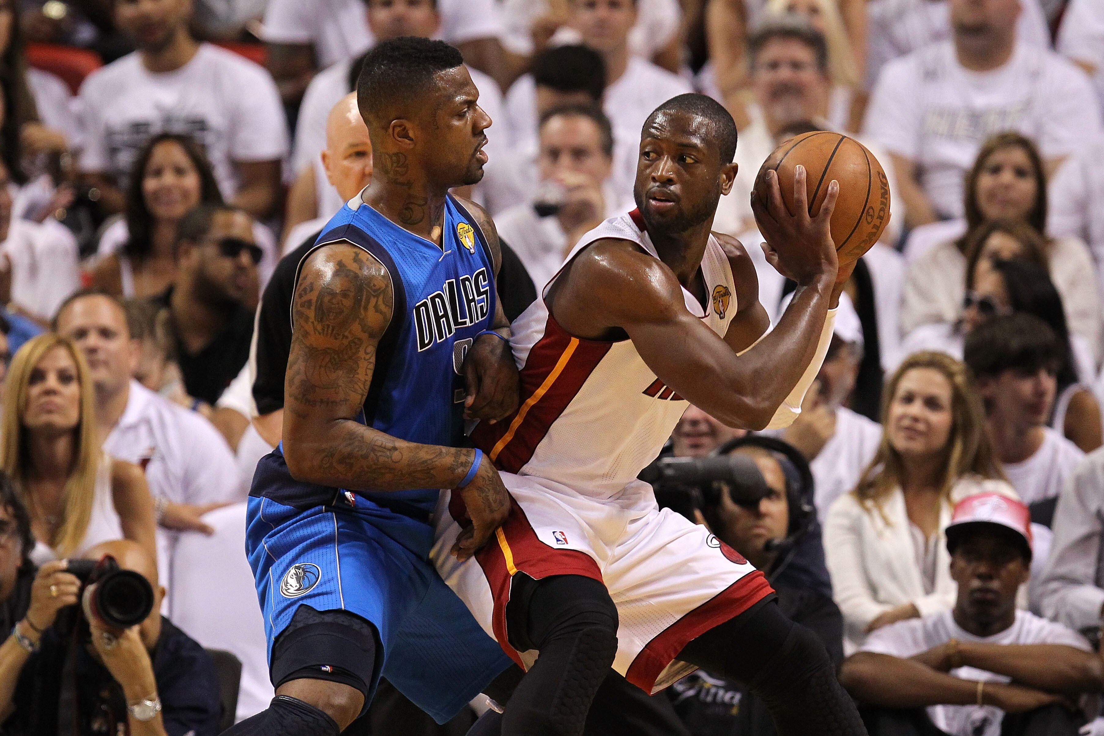 MIAMI, FL - JUNE 02:  Dwyane Wade #3 of the Miami Heat looks to pass against DeShawn Stevenson #92 of the Dallas Mavericks in Game Two of the 2011 NBA Finals at American Airlines Arena on June 2, 2011 in Miami, Florida. NOTE TO USER: User expressly acknow