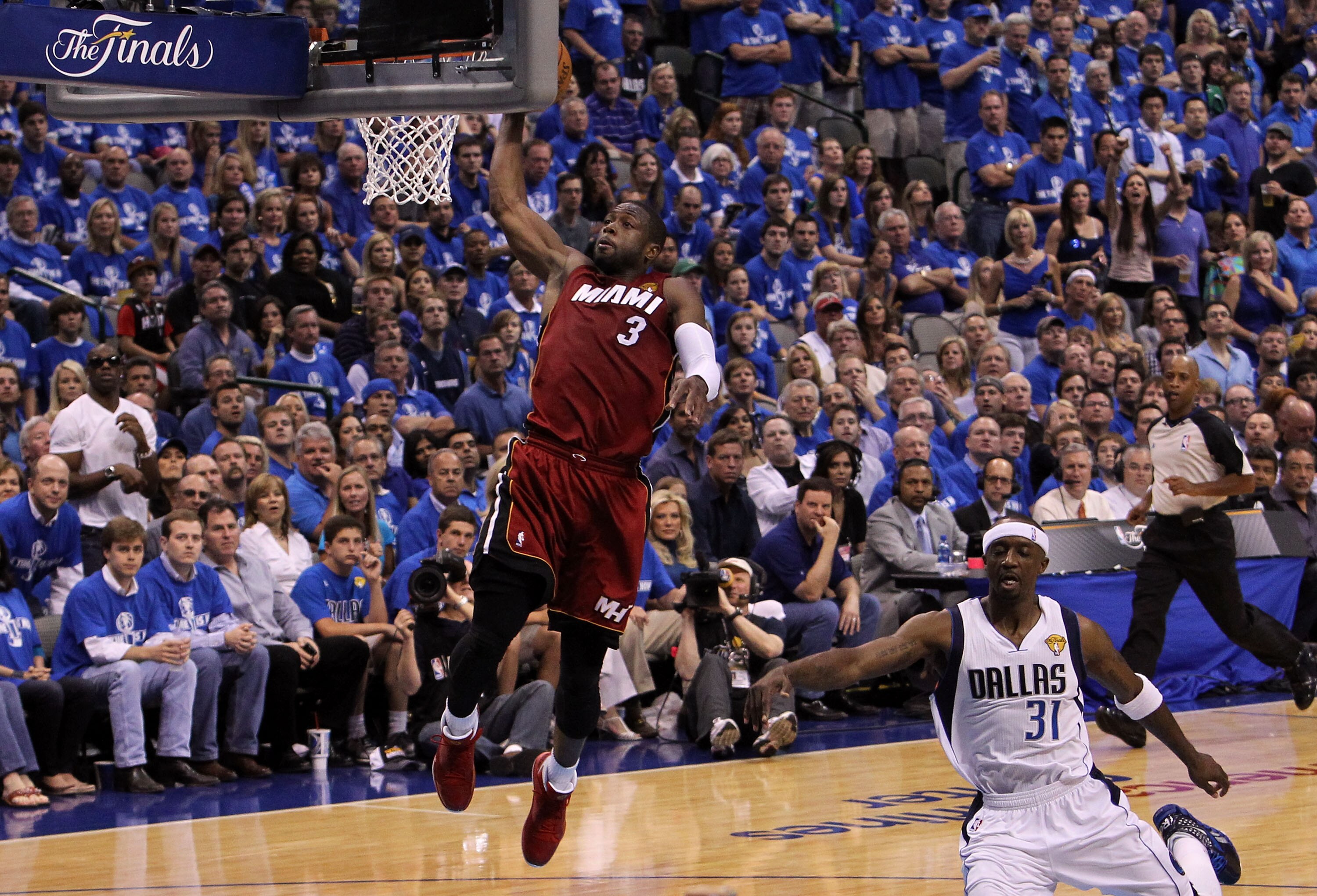 DALLAS, TX - JUNE 05:  Dwyane Wade #3 of the Miami Heat dunks against Jason Terry #31 of the Dallas Mavericks in Game Three of the 2011 NBA Finals at American Airlines Center on June 5, 2011 in Dallas, Texas.  NOTE TO USER: User expressly acknowledges and