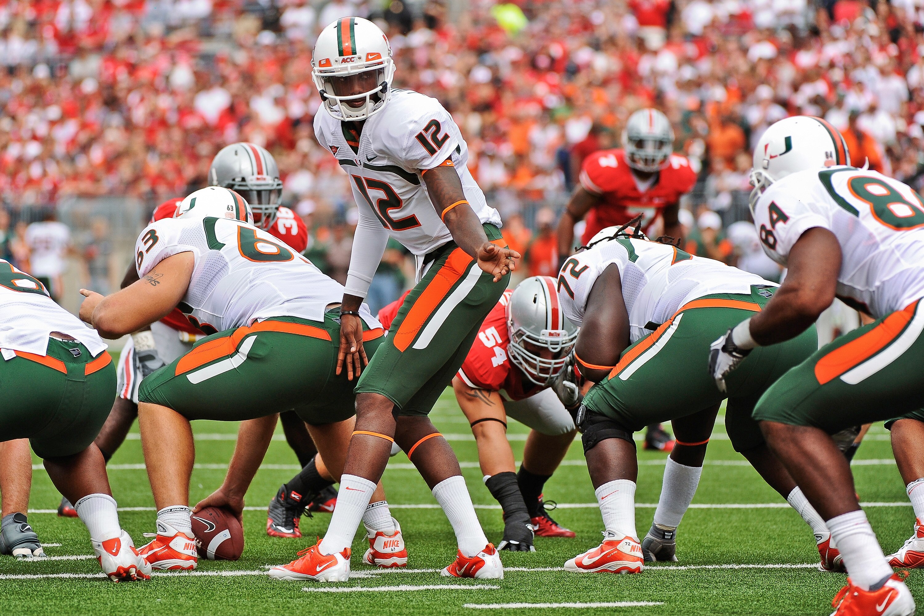 COLUMBUS, OH - SEPTEMBER 11:  Quarterback Jacory Harris #12 of the Miami Hurricanes calls the play at the line against the Ohio State Buckeyes at Ohio Stadium on September 11, 2010 in Columbus, Ohio.  (Photo by Jamie Sabau/Getty Images)