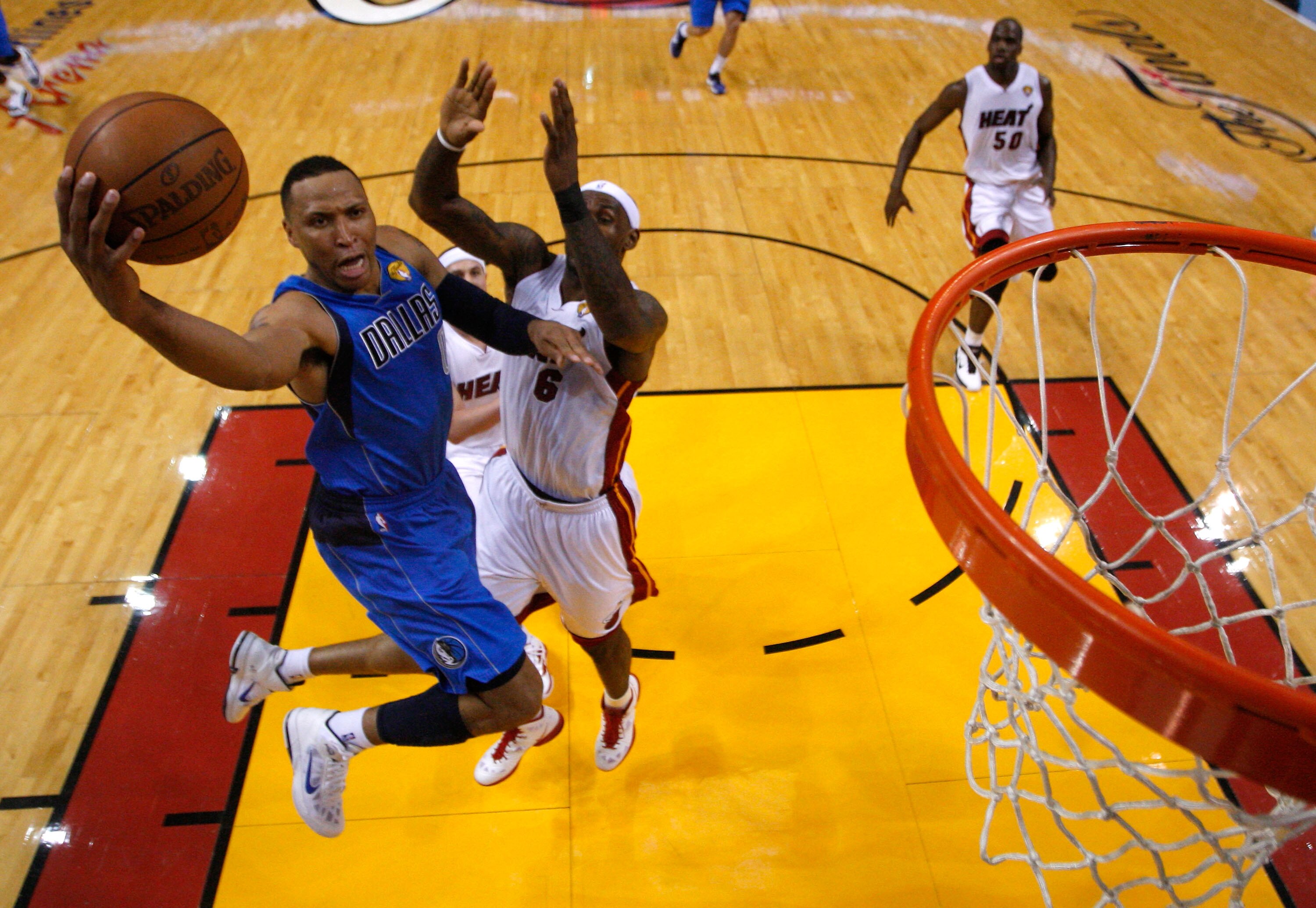 MIAMI, FL - JUNE 02:  Shawn Marion #0 of the Dallas Mavericks drives for a shot attempt against LeBron James #6 of the Miami Heat in Game Two of the 2011 NBA Finals at American Airlines Arena on June 2, 2011 in Miami, Florida. NOTE TO USER: User expressly