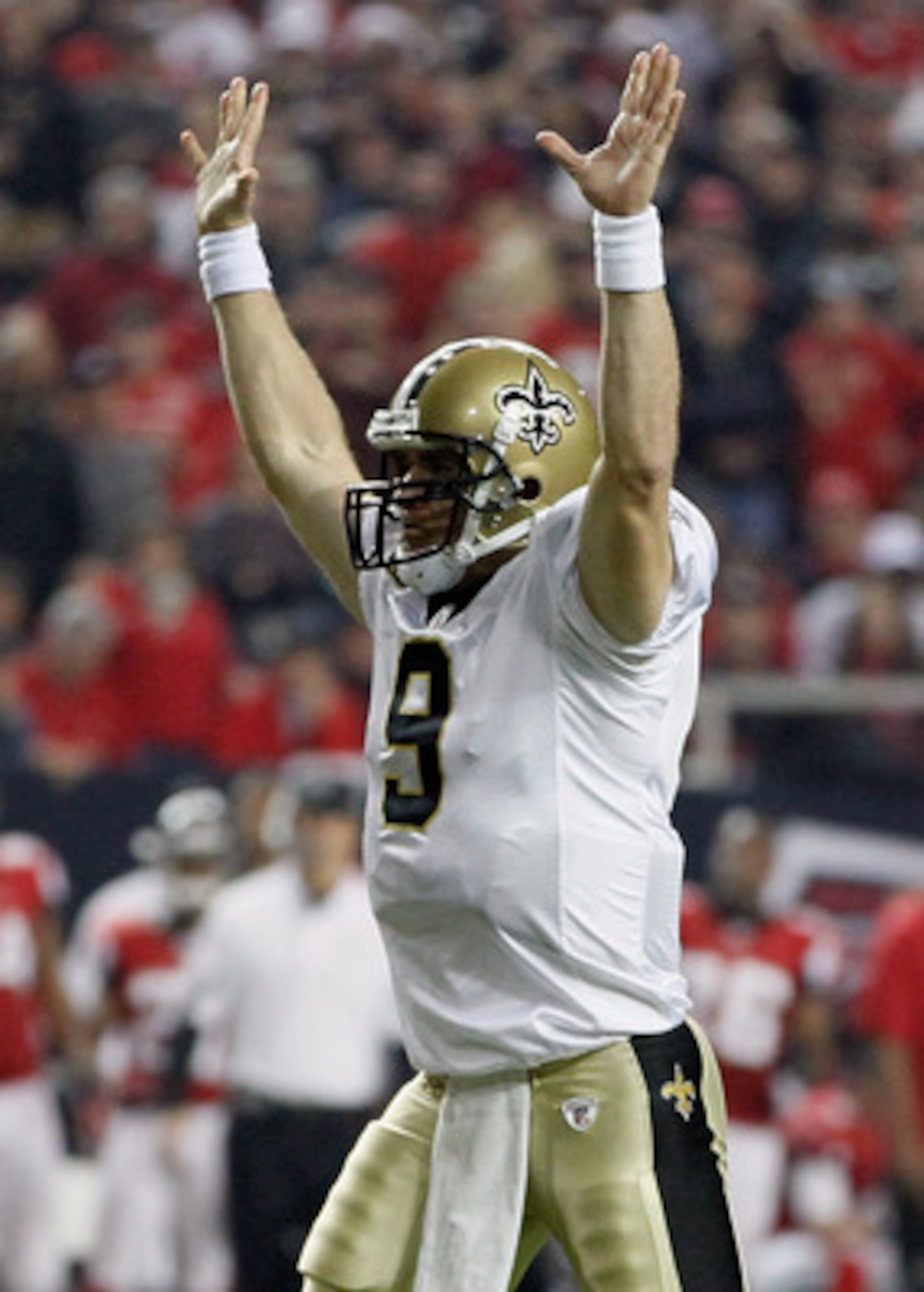 ATLANTA, GA - DECEMBER 27:  Quarterback Drew Brees #9 of the New Orleans Saints celebrates a touchdown pass in the first half during the game against the Atlanta Falcons at the Georgia Dome on December 27, 2010 in Atlanta, Georgia.  (Photo by Kevin C. Cox
