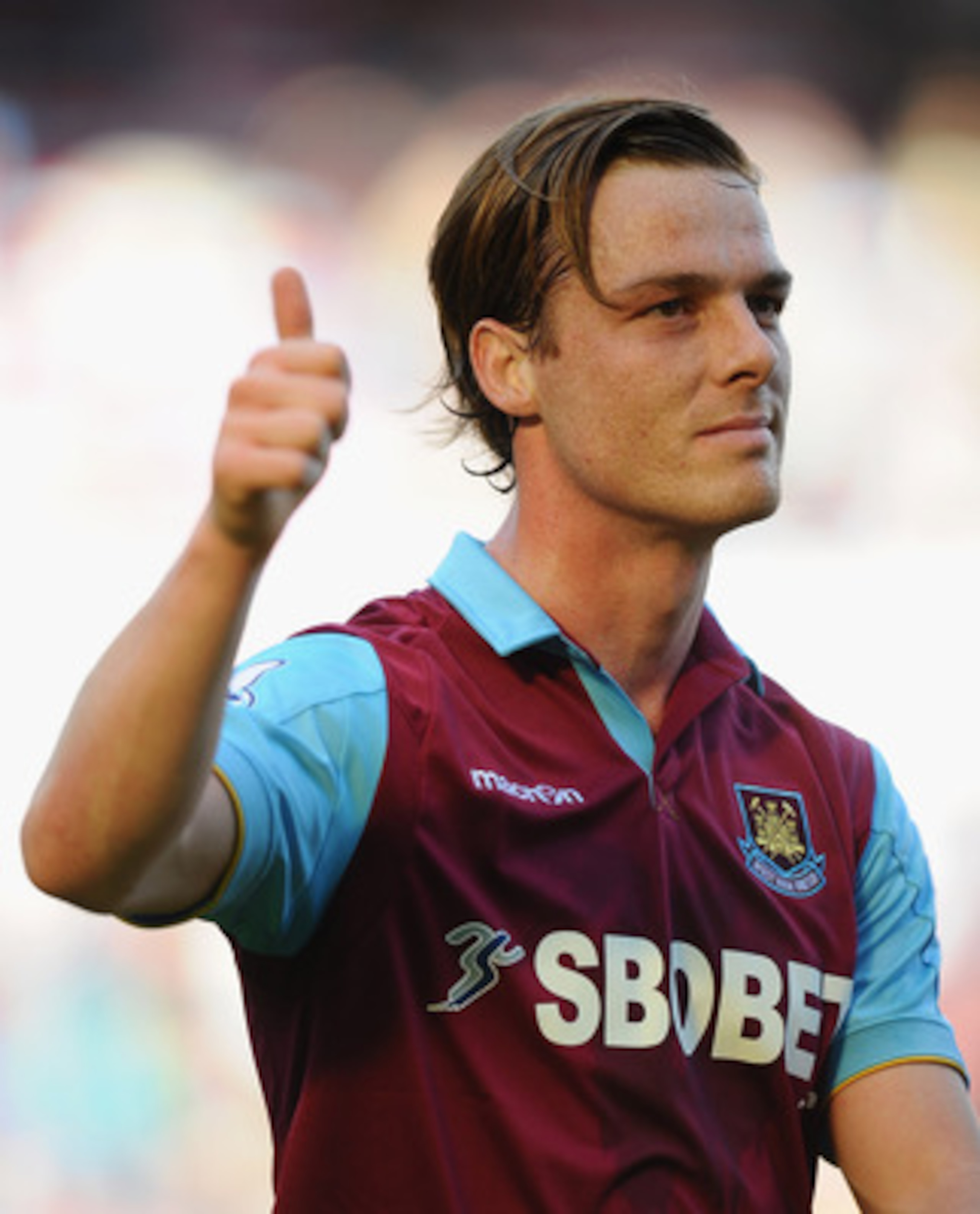 LONDON, ENGLAND - MAY 22:  Scott Parker of West Ham salutes the fans at the end of the Barclays Premier League match between West Ham United and Sunderland at Boleyn Ground on May 22, 2011 in London, England.  (Photo by Mike Hewitt/Getty Images)