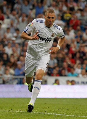 MADRID, SPAIN - MAY 10:  Karim Benzema of Real Madrid celebrates after scoring his side third goal during the La Liga match between Real Madrid and Getafe at Estadio Santiago Bernabeu on May 10, 2011 in Madrid, Spain.  (Photo by Angel Martinez/Getty Image