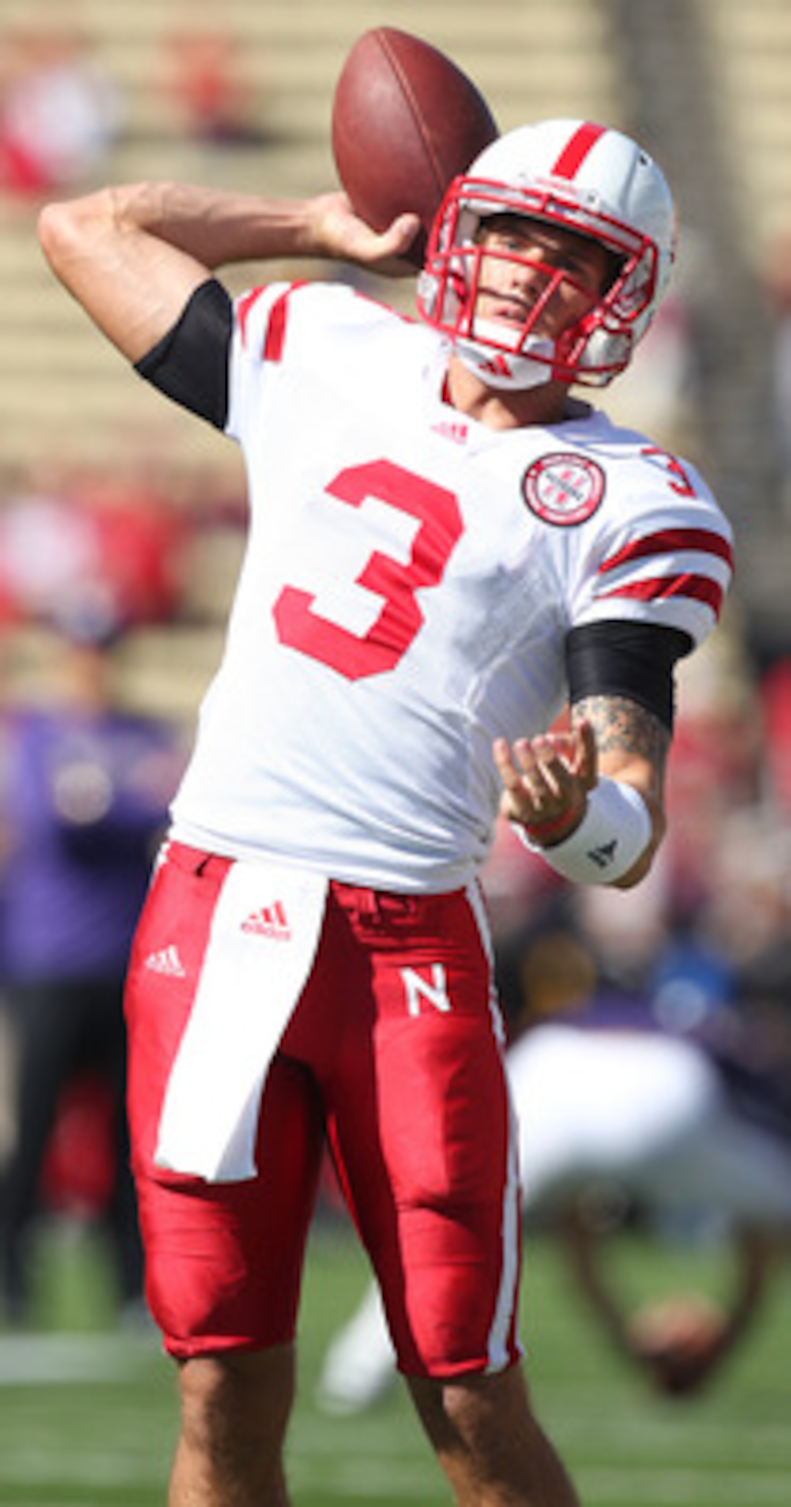 SEATTLE - SEPTEMBER 18: Quarterback Taylor Martinez #3 of the Nebraska Cornhuskers passes during warmups prior to the game against the Washington Huskies on September 18, 2010 at Husky Stadium in Seattle, Washington. (Photo by Otto Greule Jr/Getty Images)