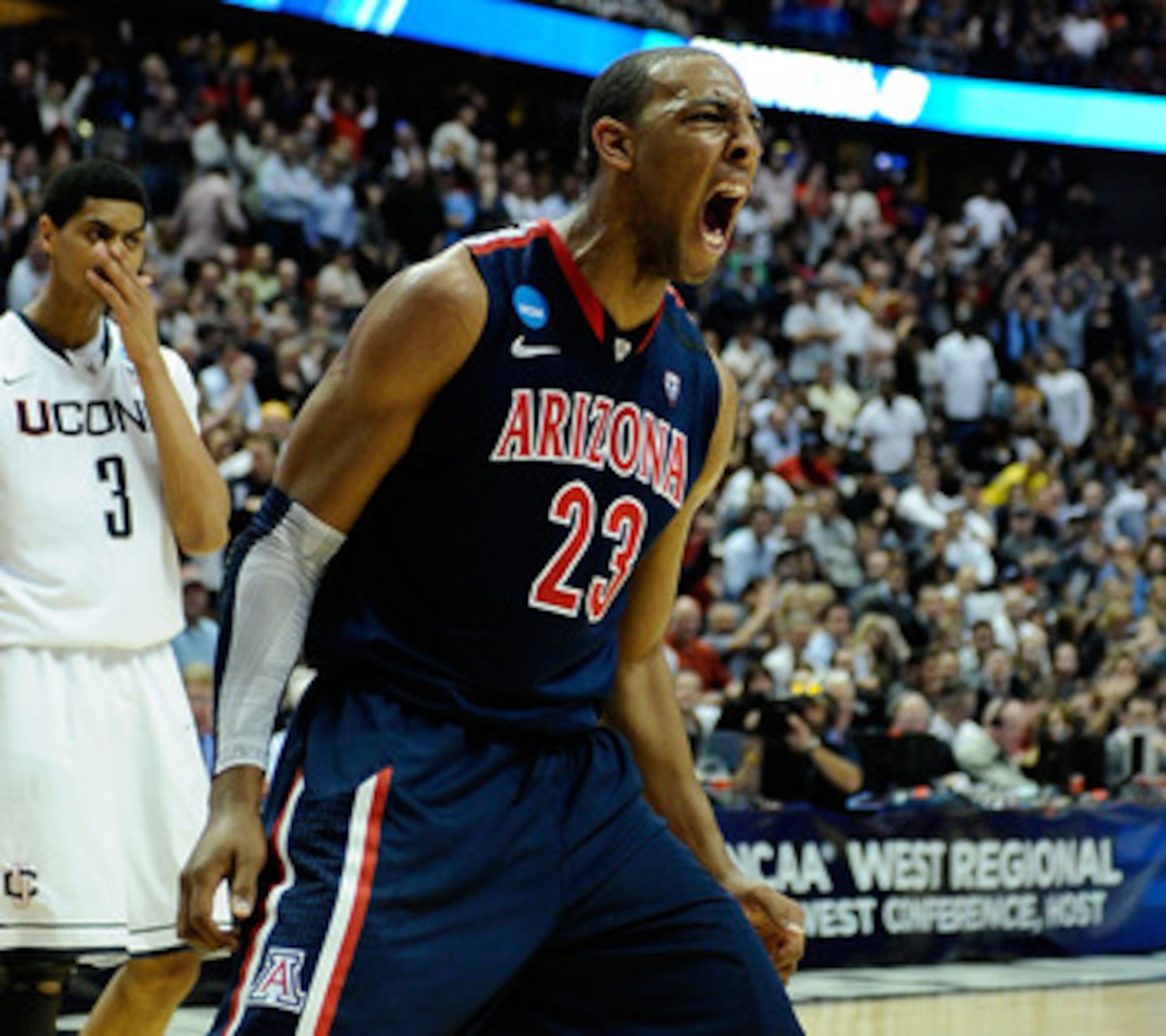 ANAHEIM, CA - MARCH 26: Derrick Williams #23 of the Arizona Wildcats reacts after a dunk against of the Connecticut Huskies during the west regional final of the 2011 NCAA men's basketball tournament at the Honda Center on March 26, 2011 in Anaheim, Cali ANAHEIM, CA - MARCH 26: Derrick Williams #23 of the Arizona Wildcats reacts after a dunk against of the Connecticut Huskies during the west regional final of the 2011 NCAA men's basketball tournament at the Honda Center on March 26, 2011 in Anaheim, Cali