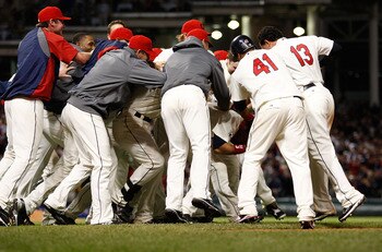 CLEVELAND - APRIL 30:  Members of the Cleveland Indians mob their teammate Orlando Cabrera #20 after he hit a walk-off game winning single in the 13th inning against the Detroit Tigers during the game on April 30, 2011 at Progressive Field in Cleveland, O