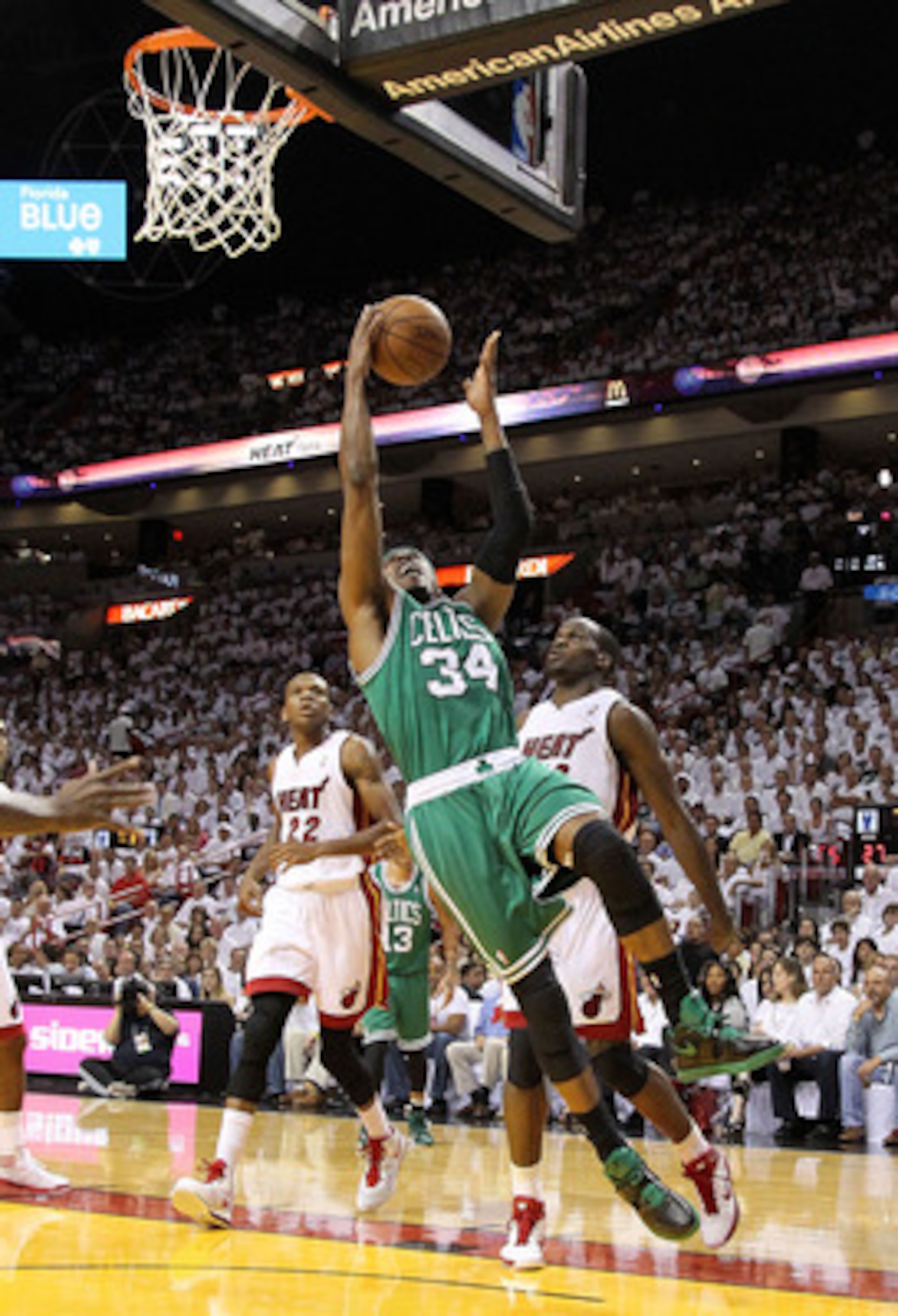 MIAMI, FL - MAY 11:  Paul Pierce #34 of the Boston Celtics drives against Joel Anthony #50 of the Miami Heat during Game Five of the Eastern Conference Semifinals of the 2011 NBA Playoffs at American Airlines Arena on May 11, 2011 in Miami, Florida. NOTE 