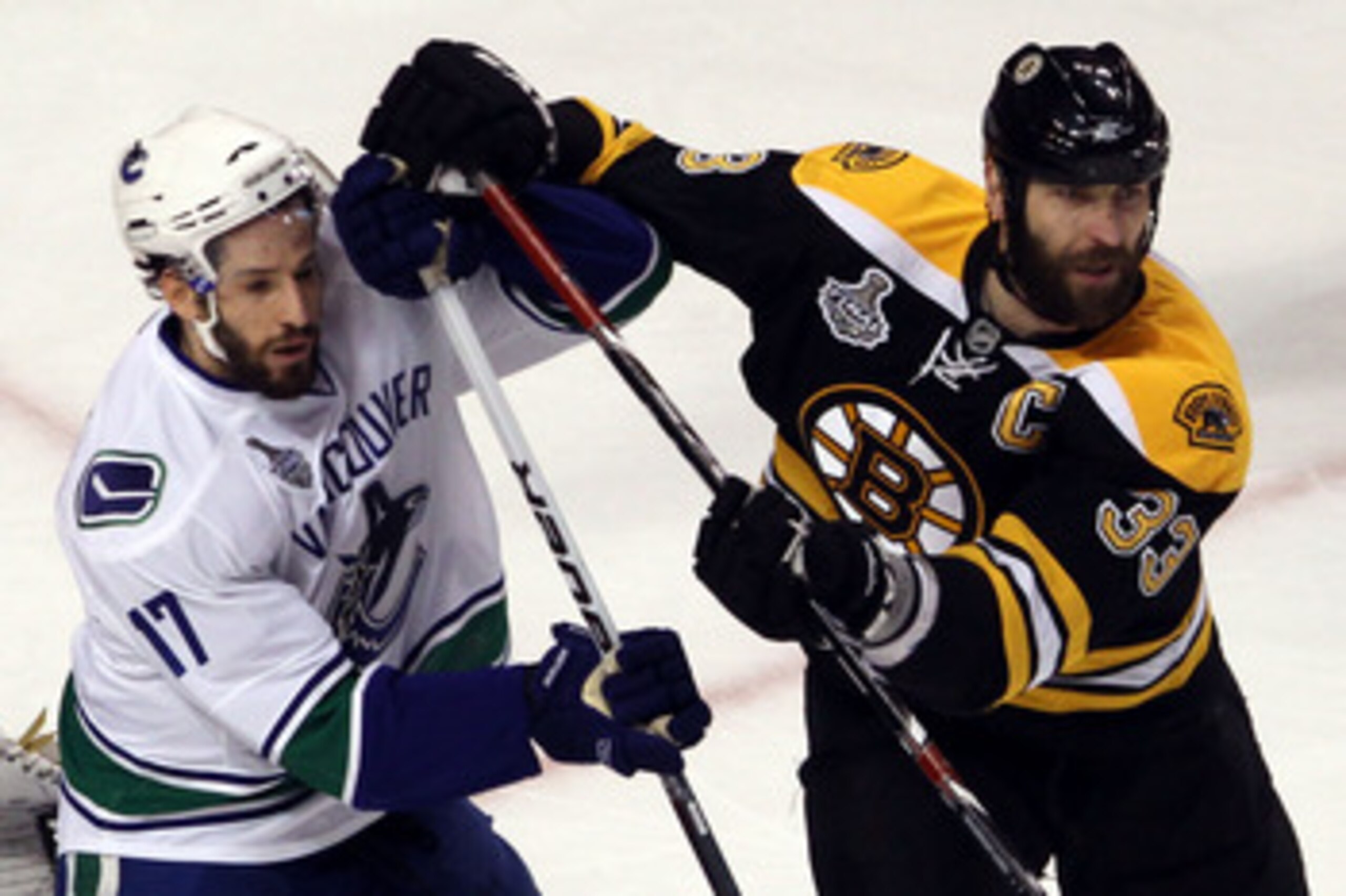 BOSTON, MA - JUNE 06:  Ryan Kesler #17 of the Vancouver Canucks fights with Zdeno Chara #33 of the Boston Bruins during Game Three of the 2011 NHL Stanley Cup Final at TD Garden on June 6, 2011 in Boston, Massachusetts.  (Photo by Bruce Bennett/Getty Imag