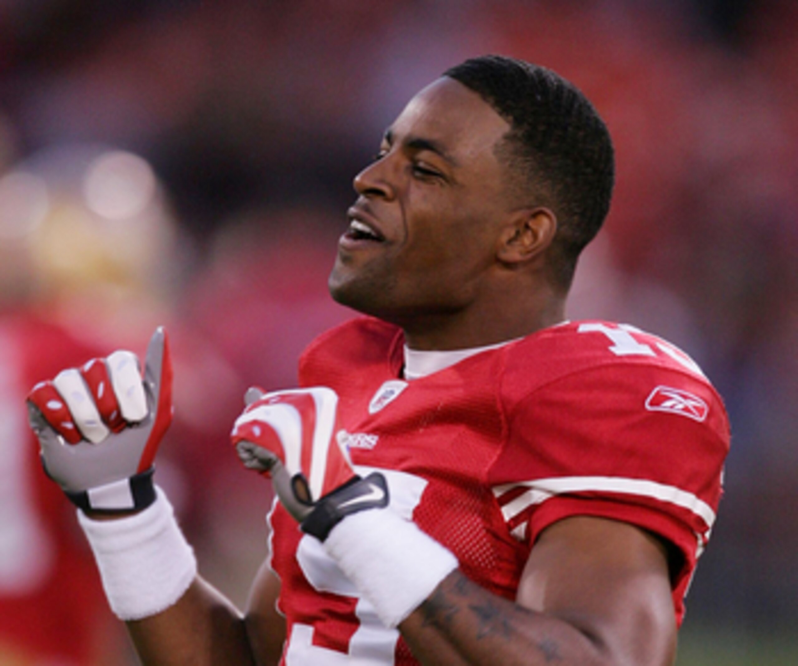 SAN FRANCISCO - DECEMBER 14: Wide receiver Michael Crabtree #15 of the San Francisco 49ers stands on the field prior to their game against the Arizona Cardinals at Candlestick Park on December 14, 2009 in San Francisco, California. (Photo by Ezra Shaw/Get