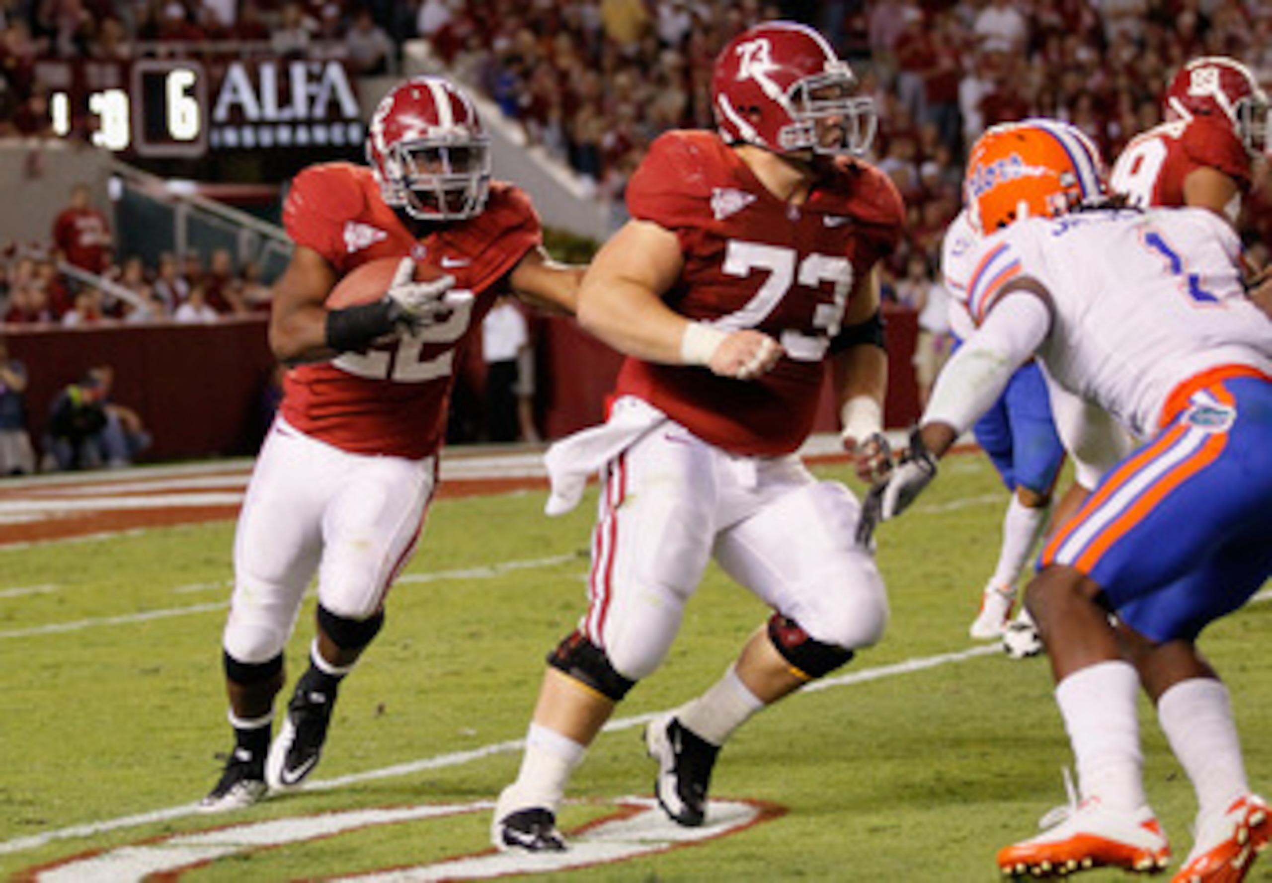 TUSCALOOSA, AL - OCTOBER 02:  Mark Ingram #22 and William Vlachos #73 of the Alabama Crimson Tide against the Florida Gators at Bryant-Denny Stadium on October 2, 2010 in Tuscaloosa, Alabama.  (Photo by Kevin C. Cox/Getty Images)