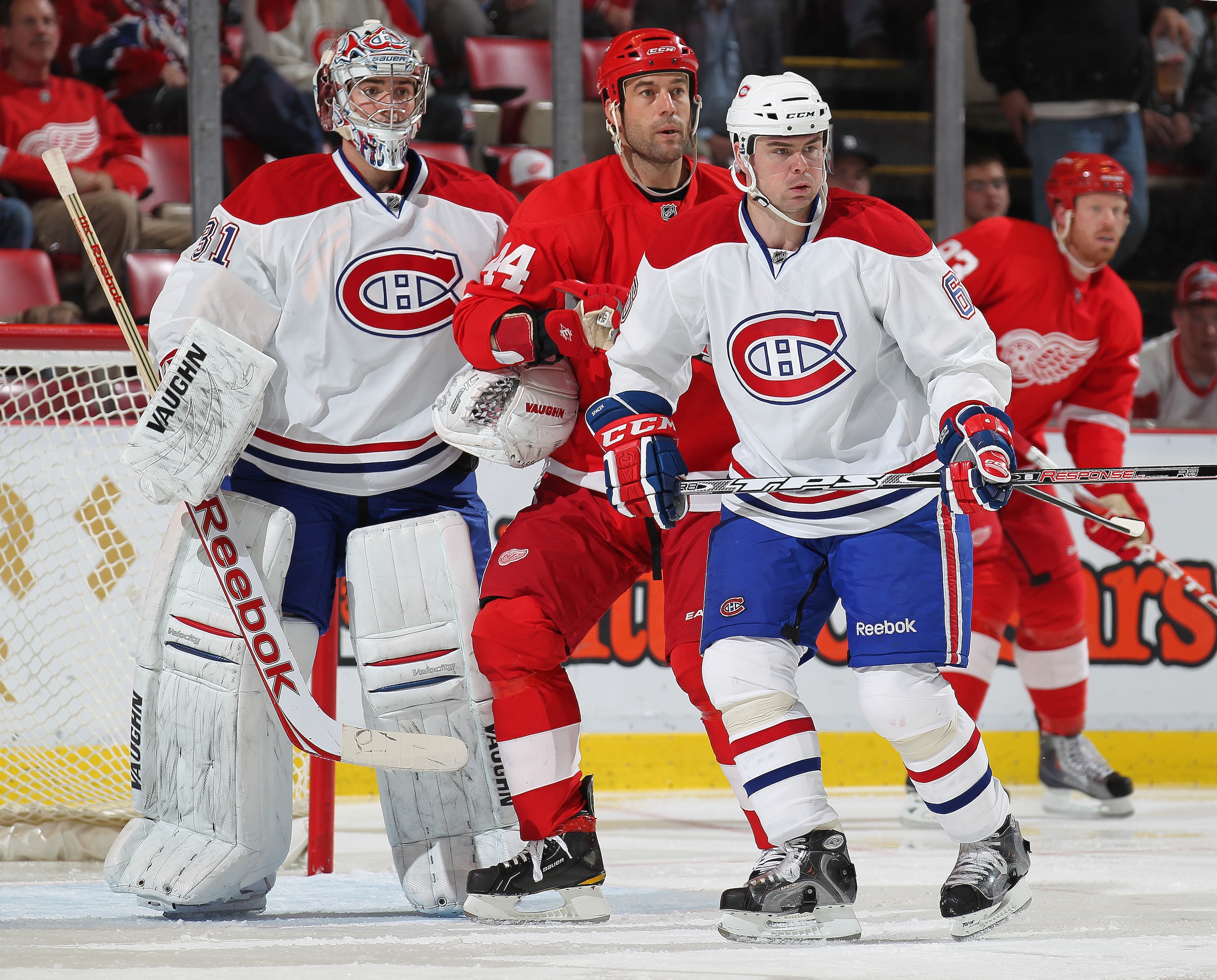 DETROIT,MI - DECEMBER 10: Goaltender Carey Price #31 and Jaroslav Spacek #6 of the Montreal Canadiens sandwich Todd Bertuzzi #44 of the Detroit Red Wings during the game at the Joe Louis Arena on December 10, 2010 in Detroit, Michigan. The Wings defeate DETROIT,MI - DECEMBER 10: Goaltender Carey Price #31 and Jaroslav Spacek #6 of the Montreal Canadiens sandwich Todd Bertuzzi #44 of the Detroit Red Wings during the game at the Joe Louis Arena on December 10, 2010 in Detroit, Michigan. The Wings defeate