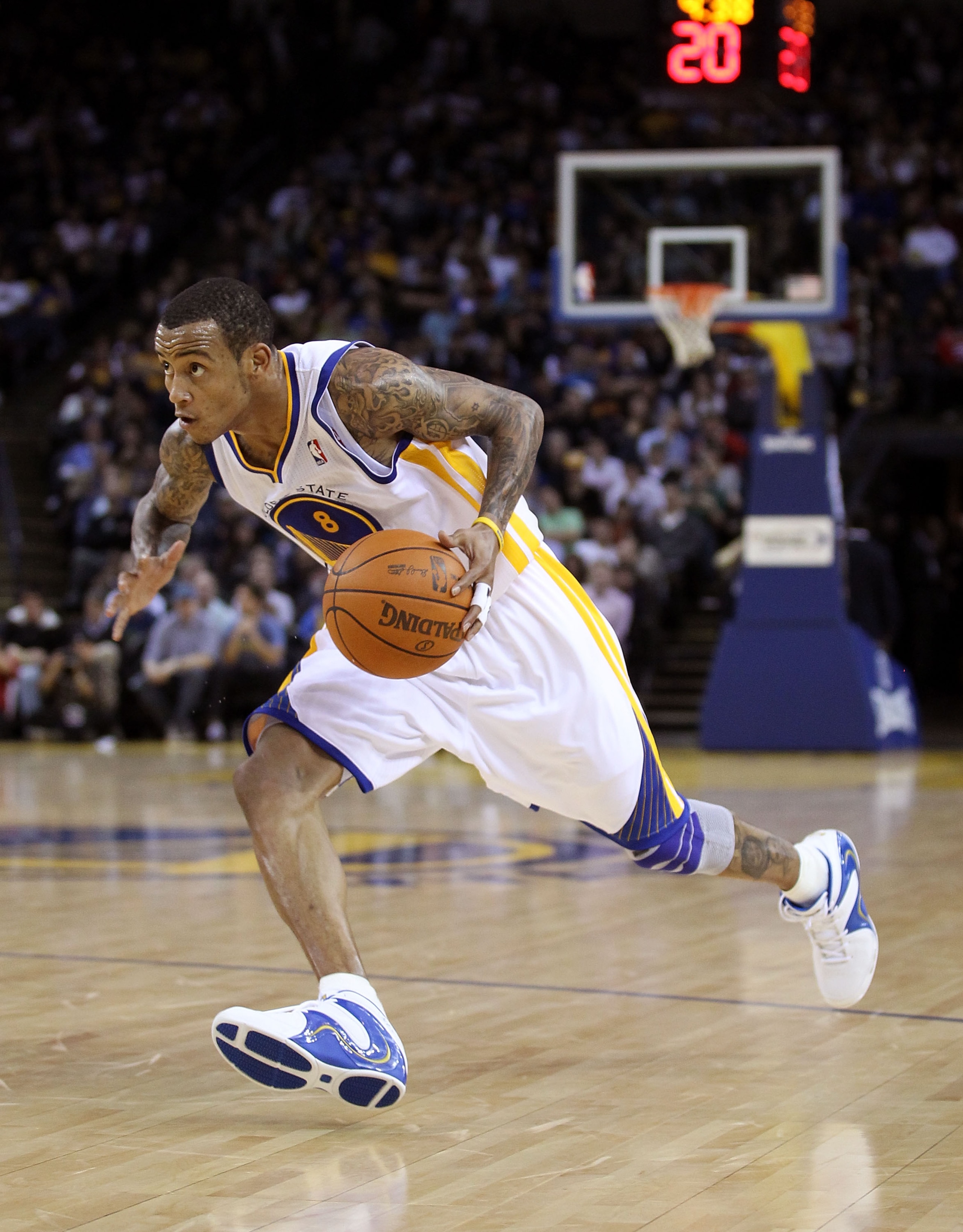 OAKLAND, CA - DECEMBER 14:  Monta Ellis #8 of the Golden State Warriors in action against the Minnesota Timberwolves at Oracle Arena on December 14, 2010 in Oakland, California.  NOTE TO USER: User expressly acknowledges and agrees that, by downloading an