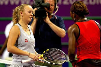 DOHA, QATAR - OCTOBER 31:  Caroline Wozniacki of Denmark retires from her match against Serena Williams of the United States during the semifinals of the Sony Ericsson WTA Championships at the Khalifa International Tennis and Squash Complex on October 31,